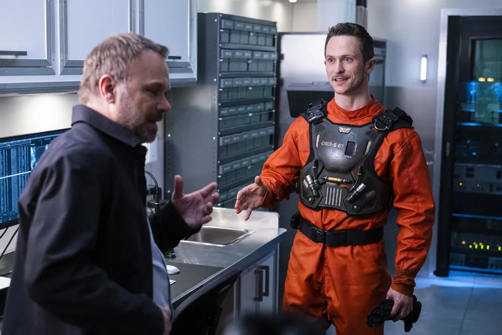 Jonathan Tucker and Norbert Leo Butz in Debris (2021)