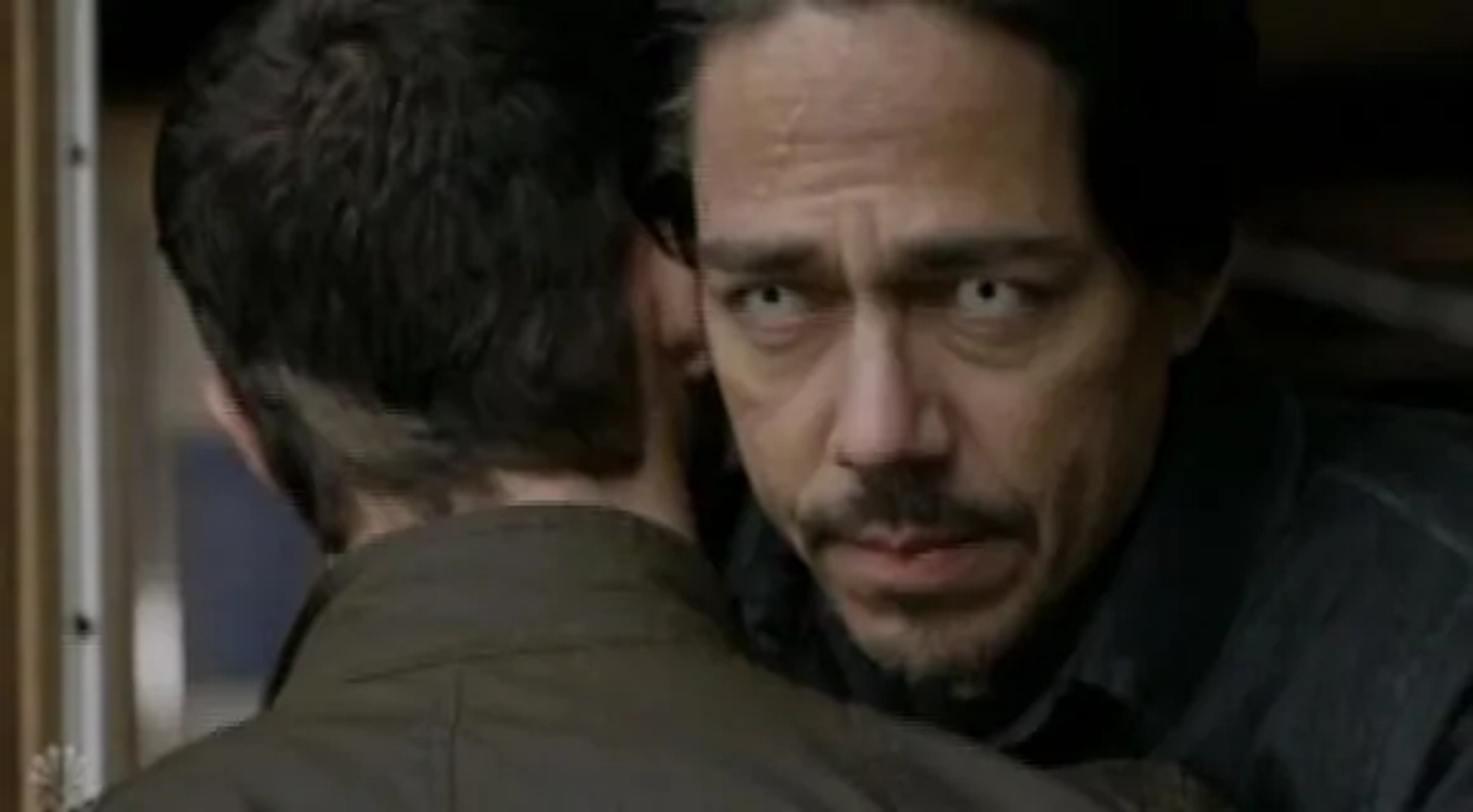 Jonathan Tucker and Zak Santiago in Debris (2021)