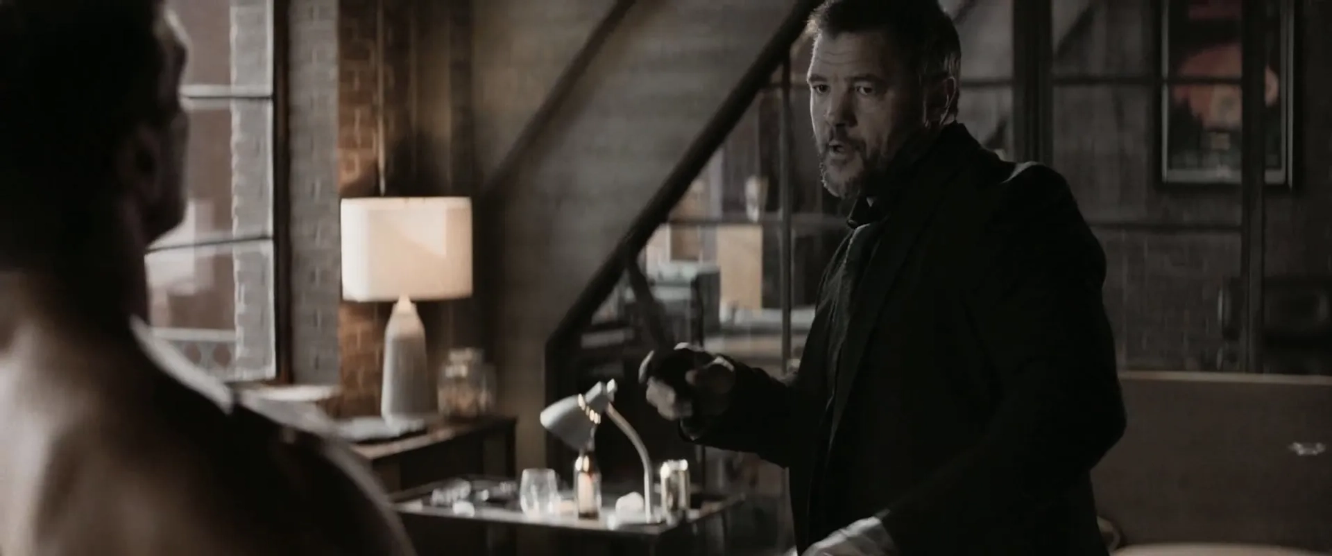 Frank Grillo and Buster Reeves in Boss Level (2020)