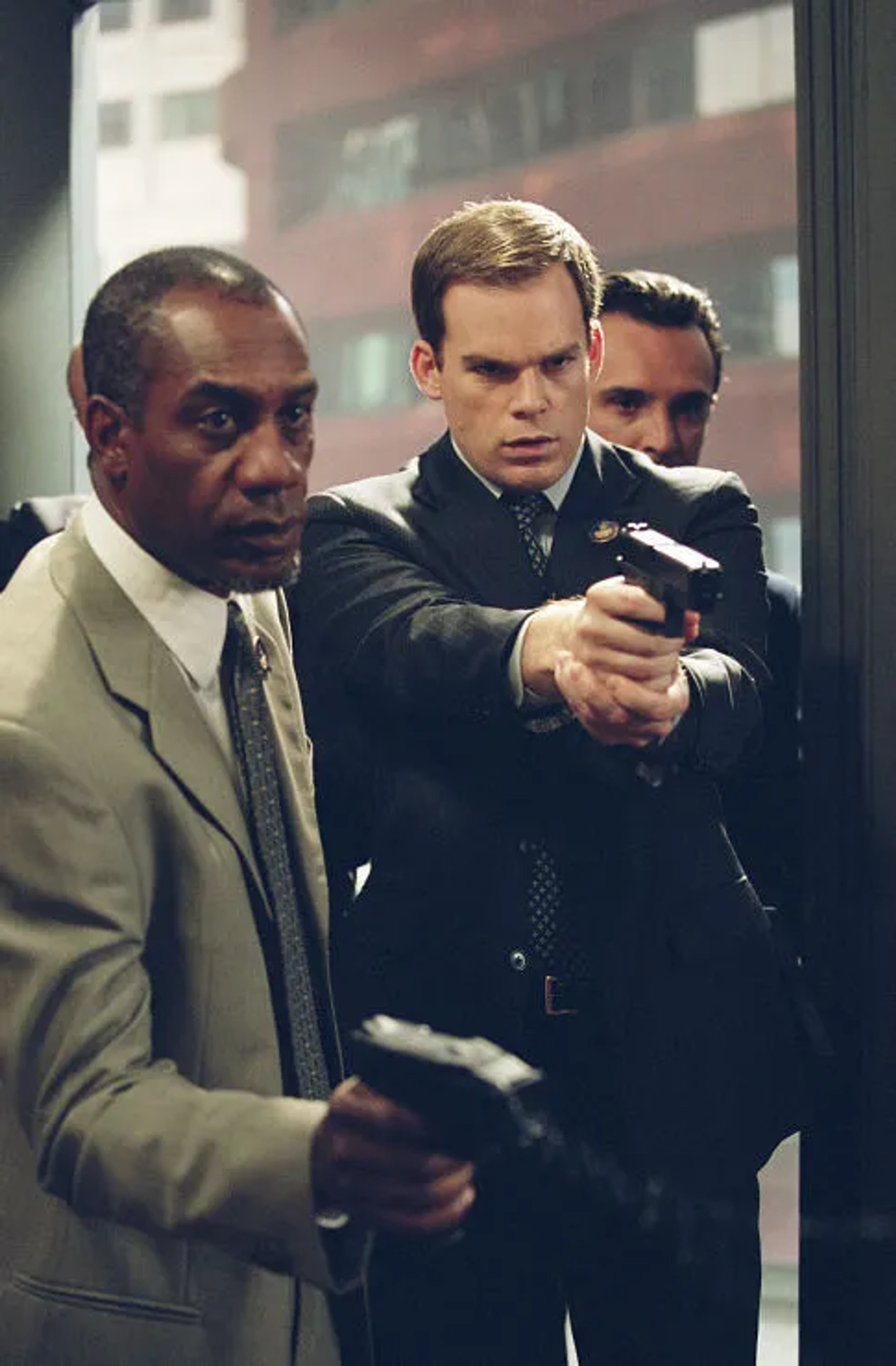 Michael C. Hall and Joe Morton in Paycheck (2003)