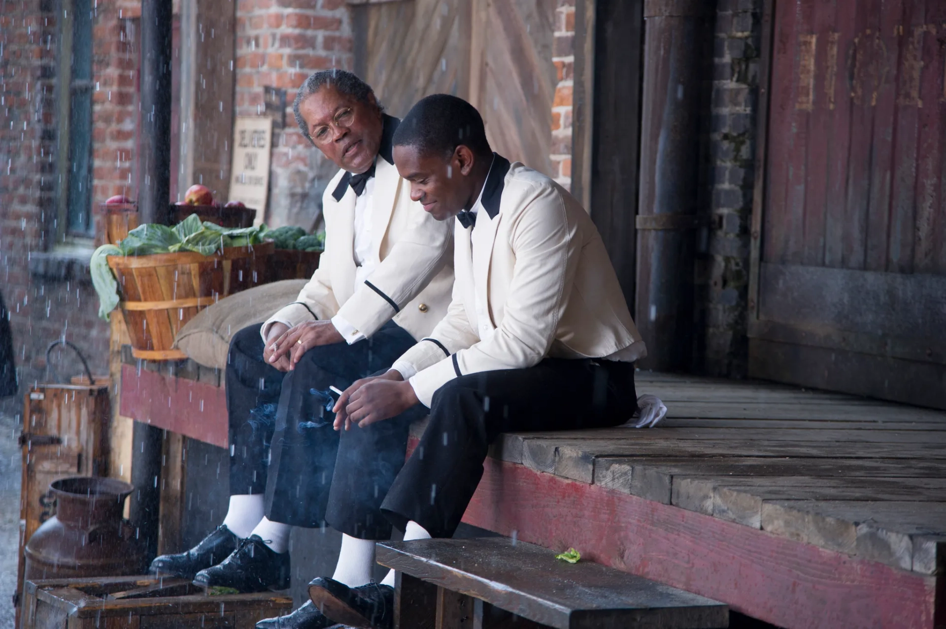 Clarence Williams III and Aml Ameen in The Butler (2013)