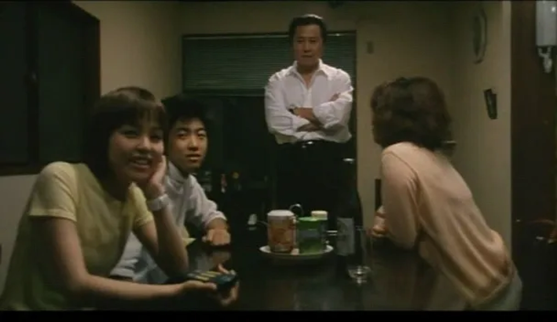 Ryo Ishibashi, Mika Kikuchi, and Hajime Matsumoto in Suicide Club (2001)