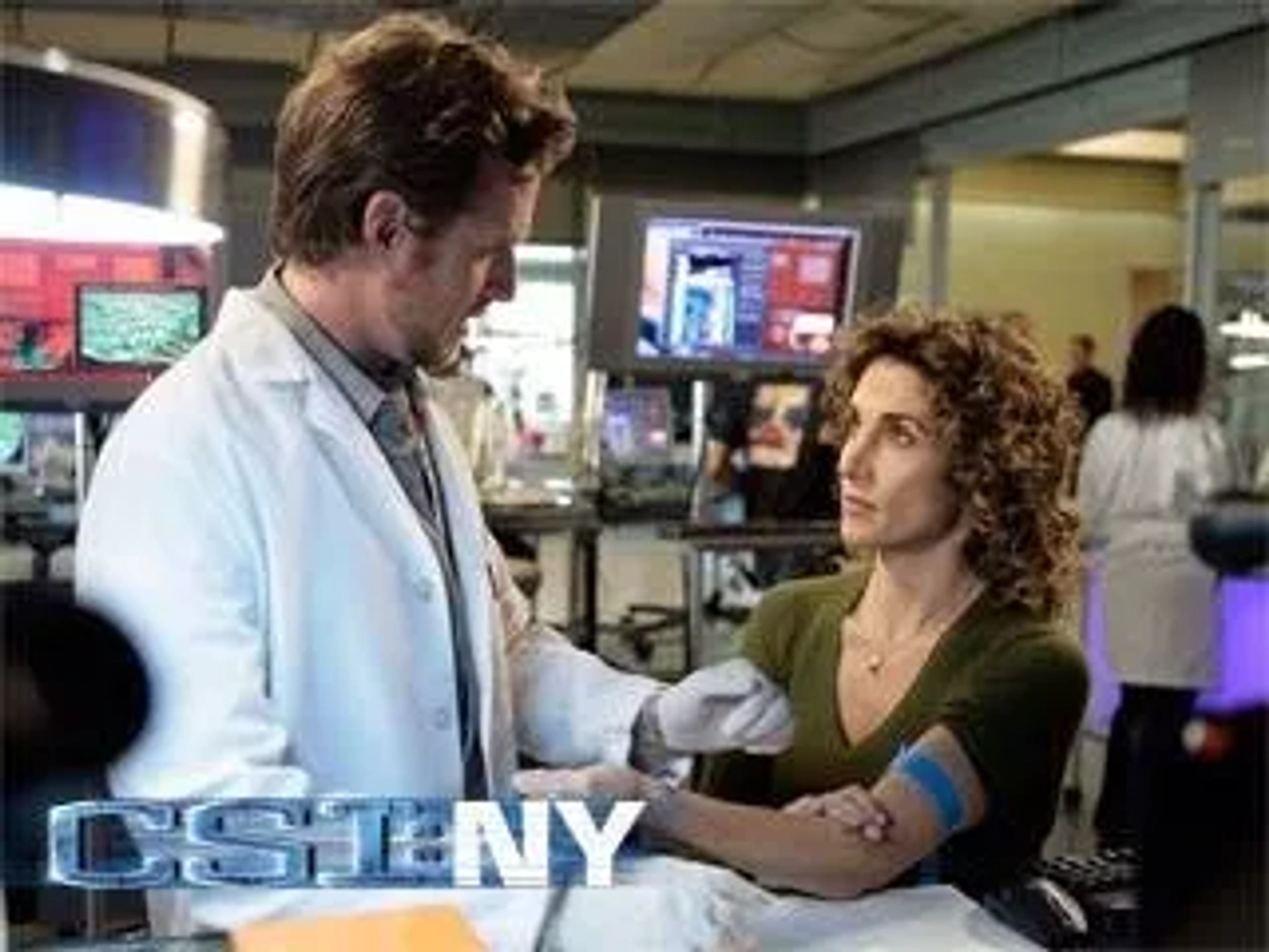 Melina Kanakaredes and A.J. Buckley in CSI: NY (2004)