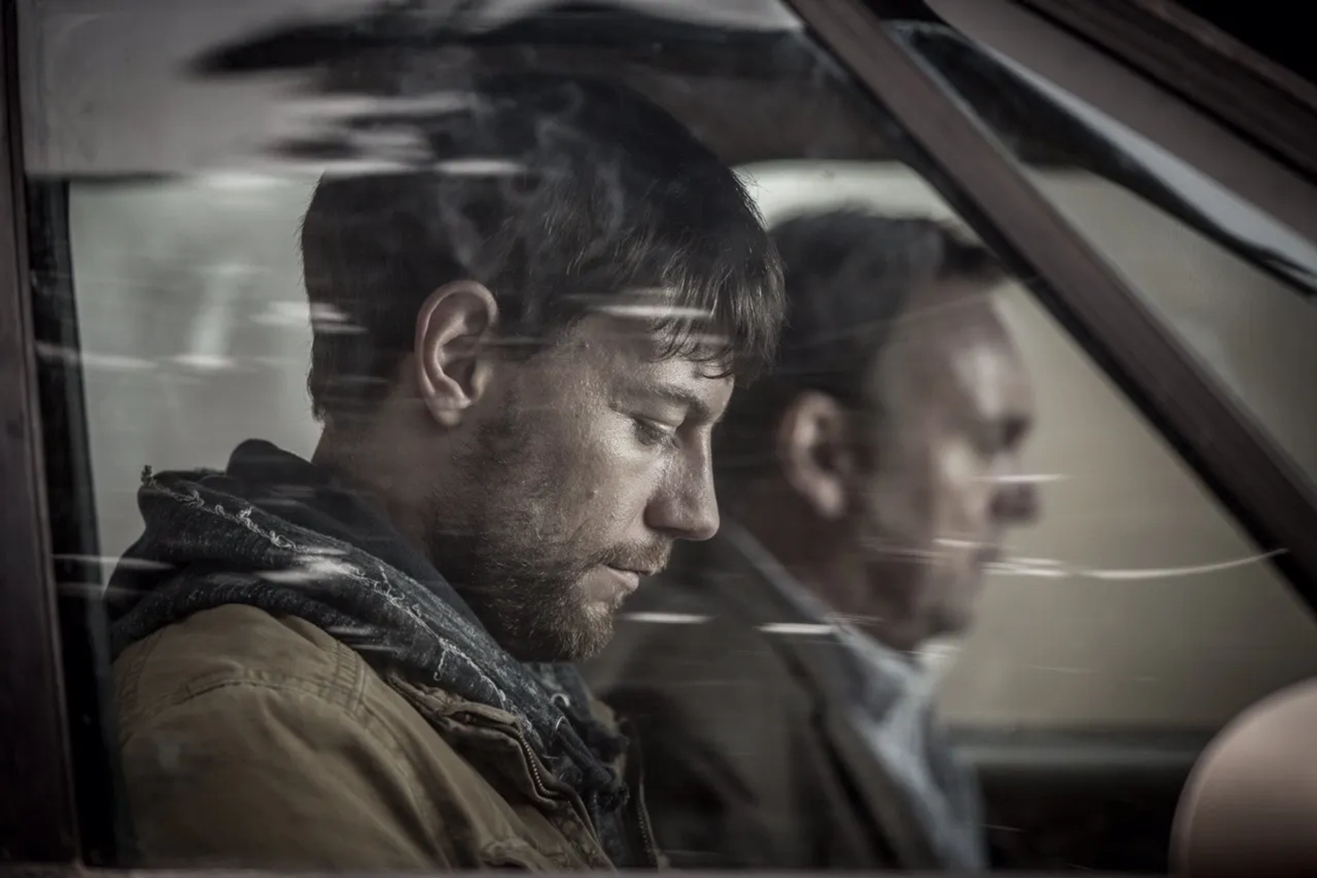 Patrick Fugit and Philip Glenister in Outcast (2016)