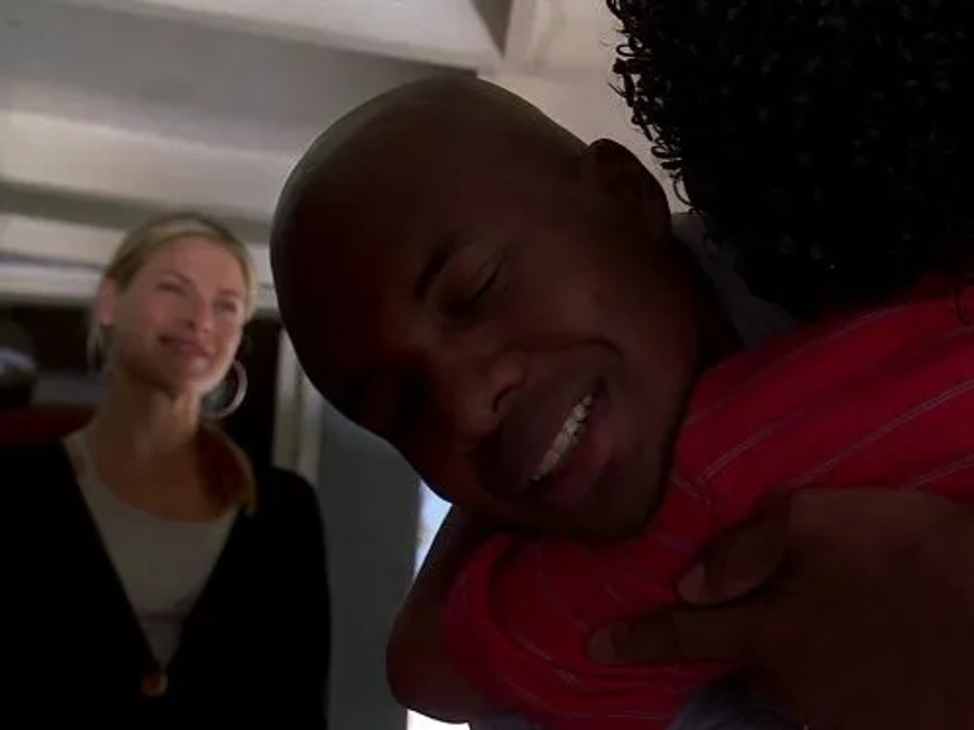 Ali Larter and Leonard Roberts in Heroes (2006)