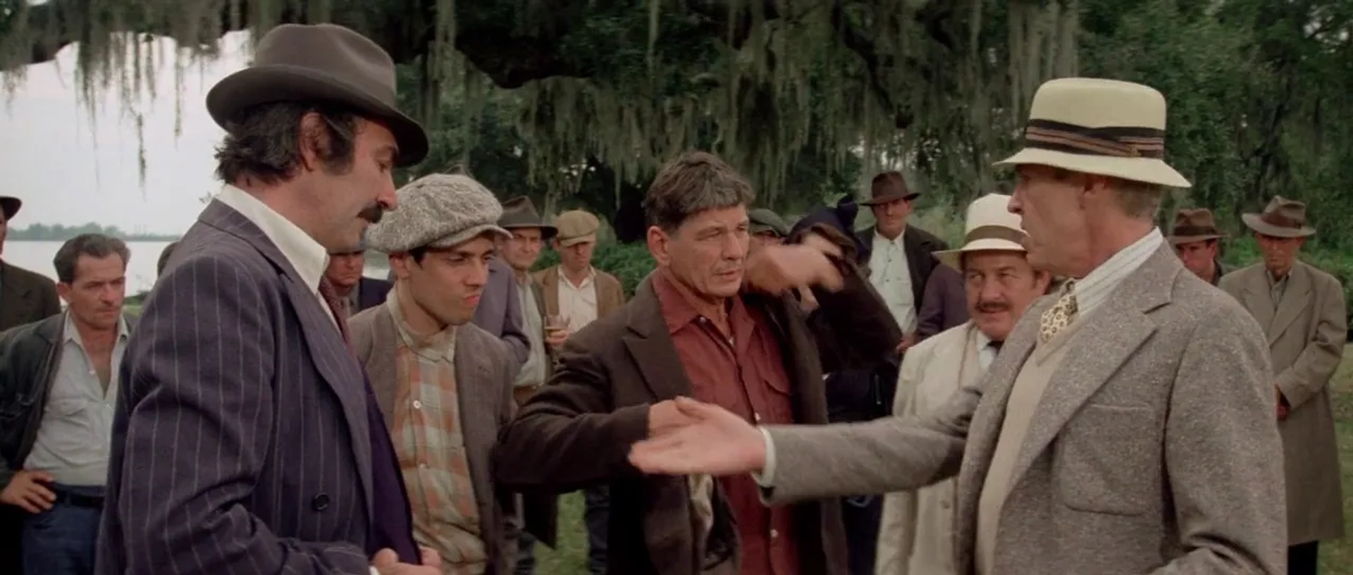 Charles Bronson, James Coburn, Strother Martin, and Edward Walsh in Hard Times (1975)