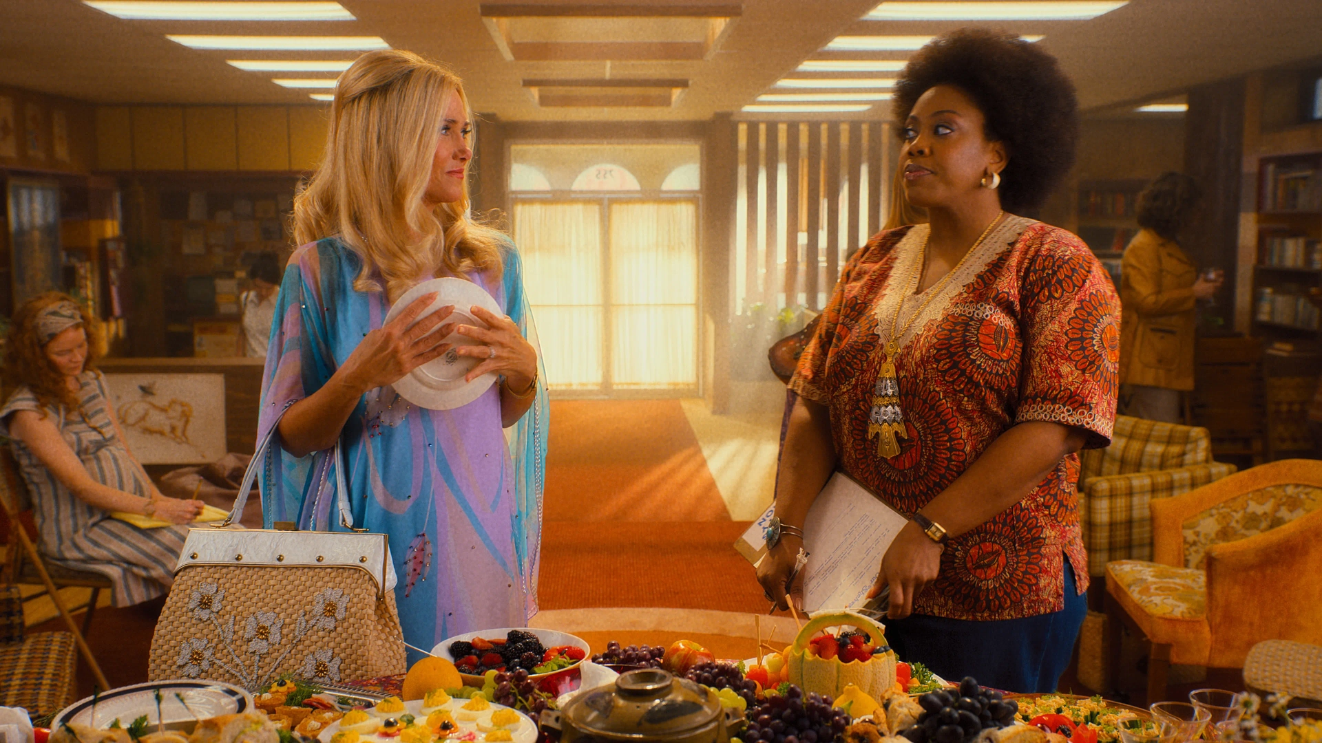 Kristen Wiig and Amber Chardae Robinson in Maxine Saves a Cat (2024)