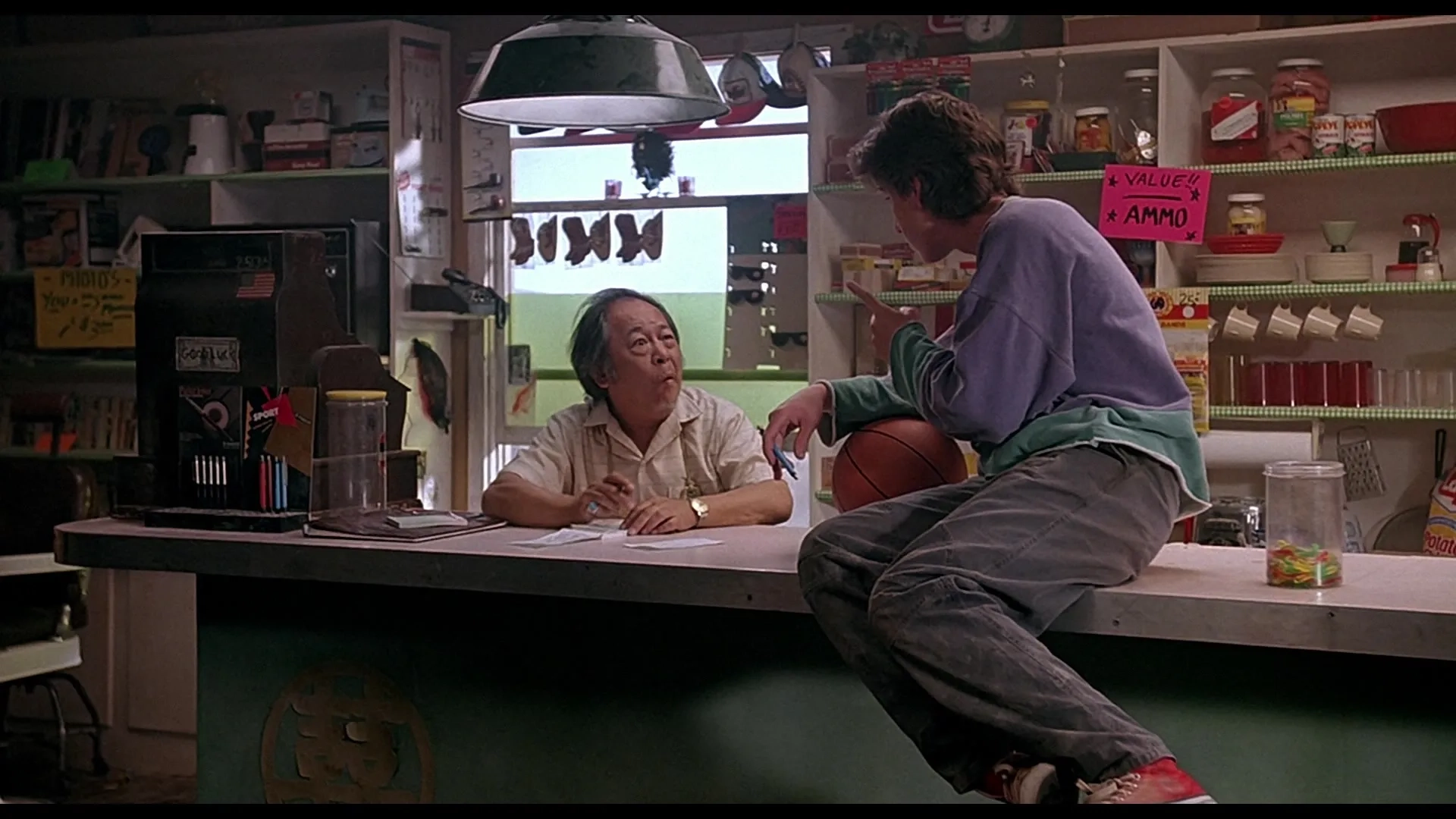 Bobby Jacoby and Victor Wong in Tremors (1990)