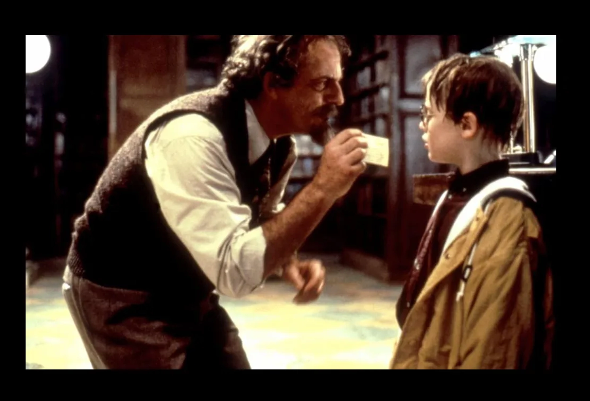Macaulay Culkin and Christopher Lloyd in The Pagemaster (1994)