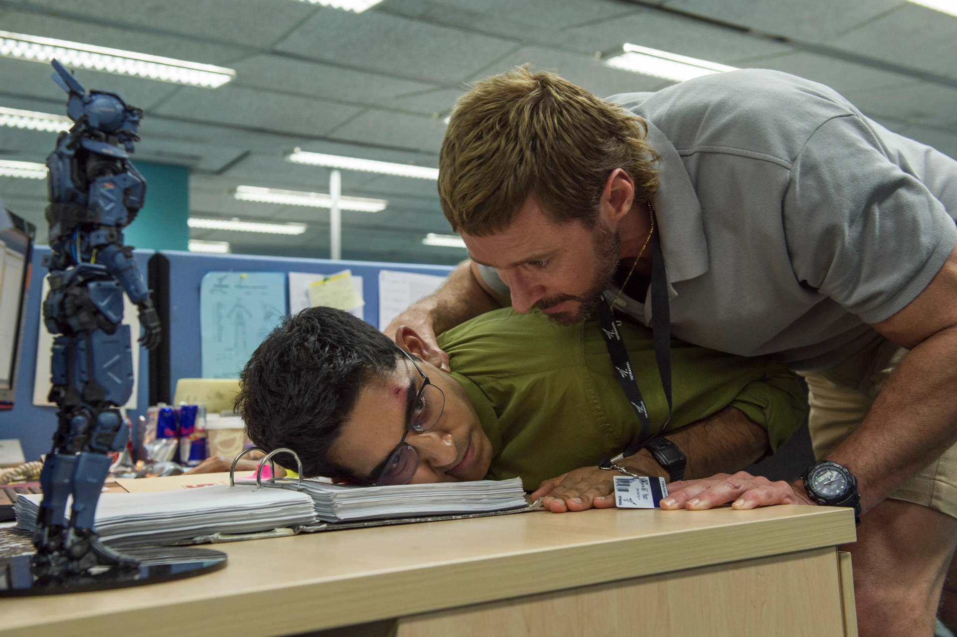Hugh Jackman and Dev Patel in Chappie (2015)
