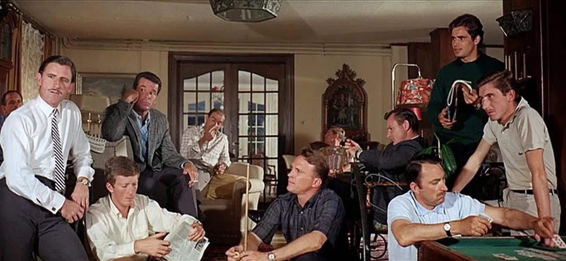 James Garner, Antonio Sabato, Dan Gurney, Graham Hill, Guy Ligier, Bruce McLaren, Jochen Rindt, Jo Schlesser, and Jo Siffert in Grand Prix (1966)