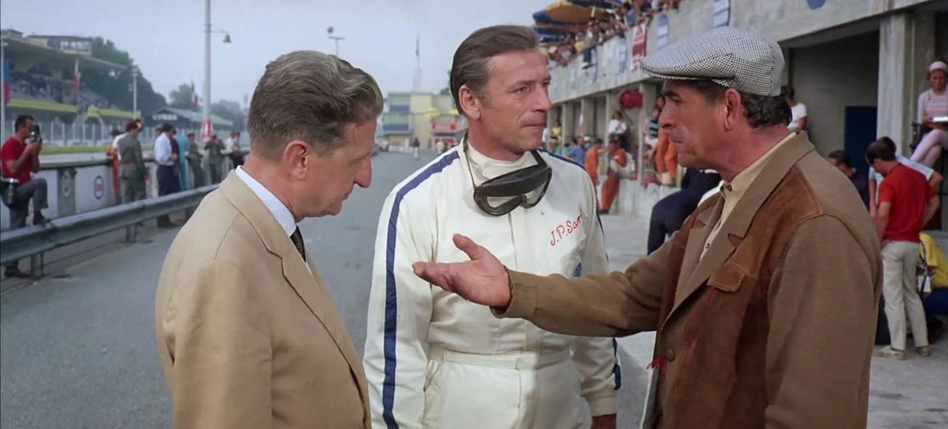 Eugenio Dragoni, Enzo Fiermonte, and Yves Montand in Grand Prix (1966)