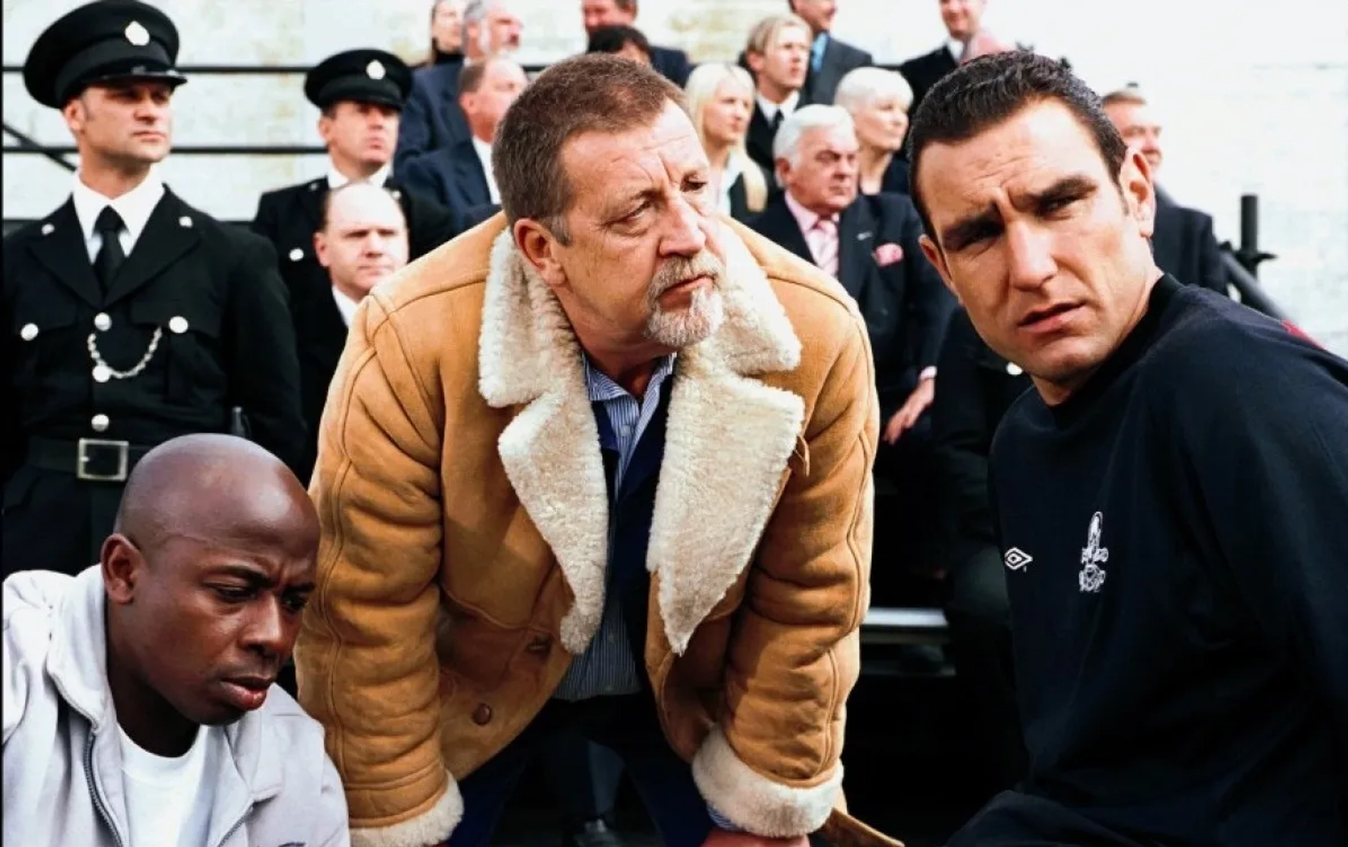 Vinnie Jones, John Forgeham, and David Hemmings in Mean Machine (2001)