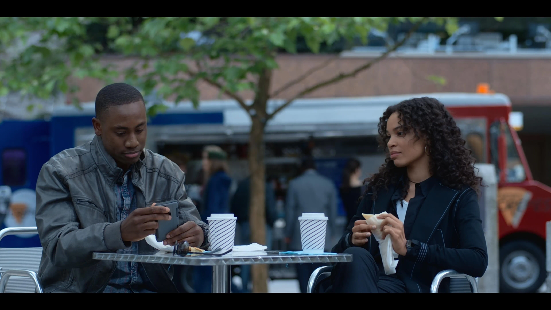 J. Alex Brinson and Nesta Cooper in Travelers (2016)