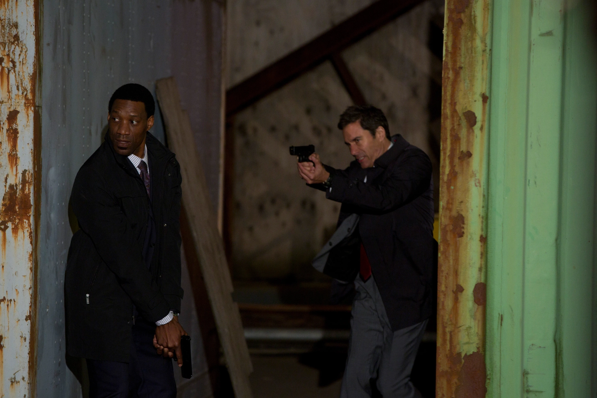 Eric McCormack and Arnold Pinnock in Travelers (2016)