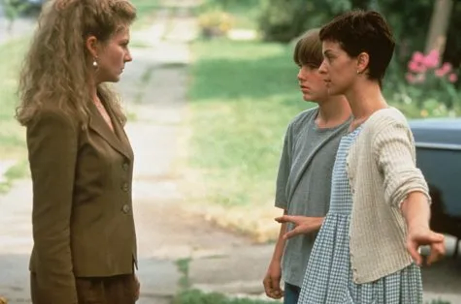 Brad Renfro, Annabella Sciorra, and Diana Scarwid in The Cure (1995)