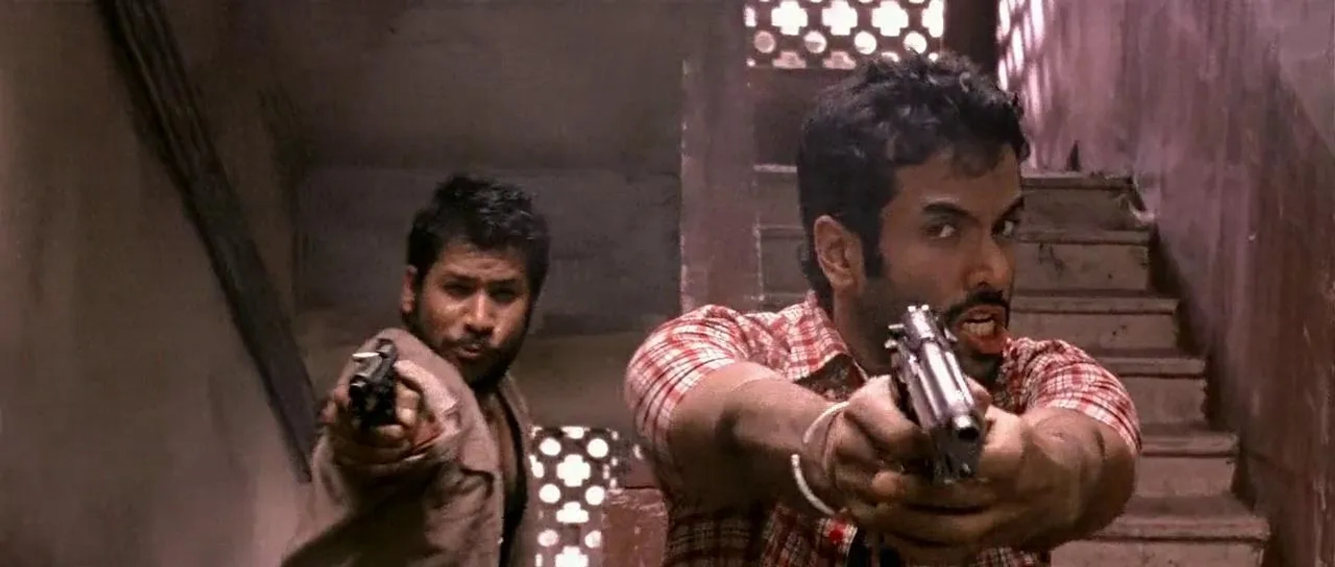 Tusshar Kapoor and Aditya Lakhia in Shootout at Lokhandwala (2007)