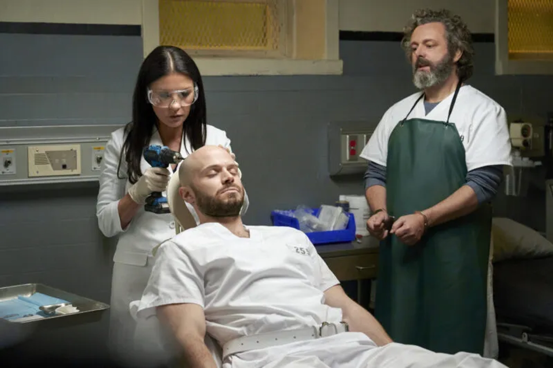 Catherine Zeta-Jones, Michael Sheen, and Dennis Flanagan in Prodigal Son (2019)