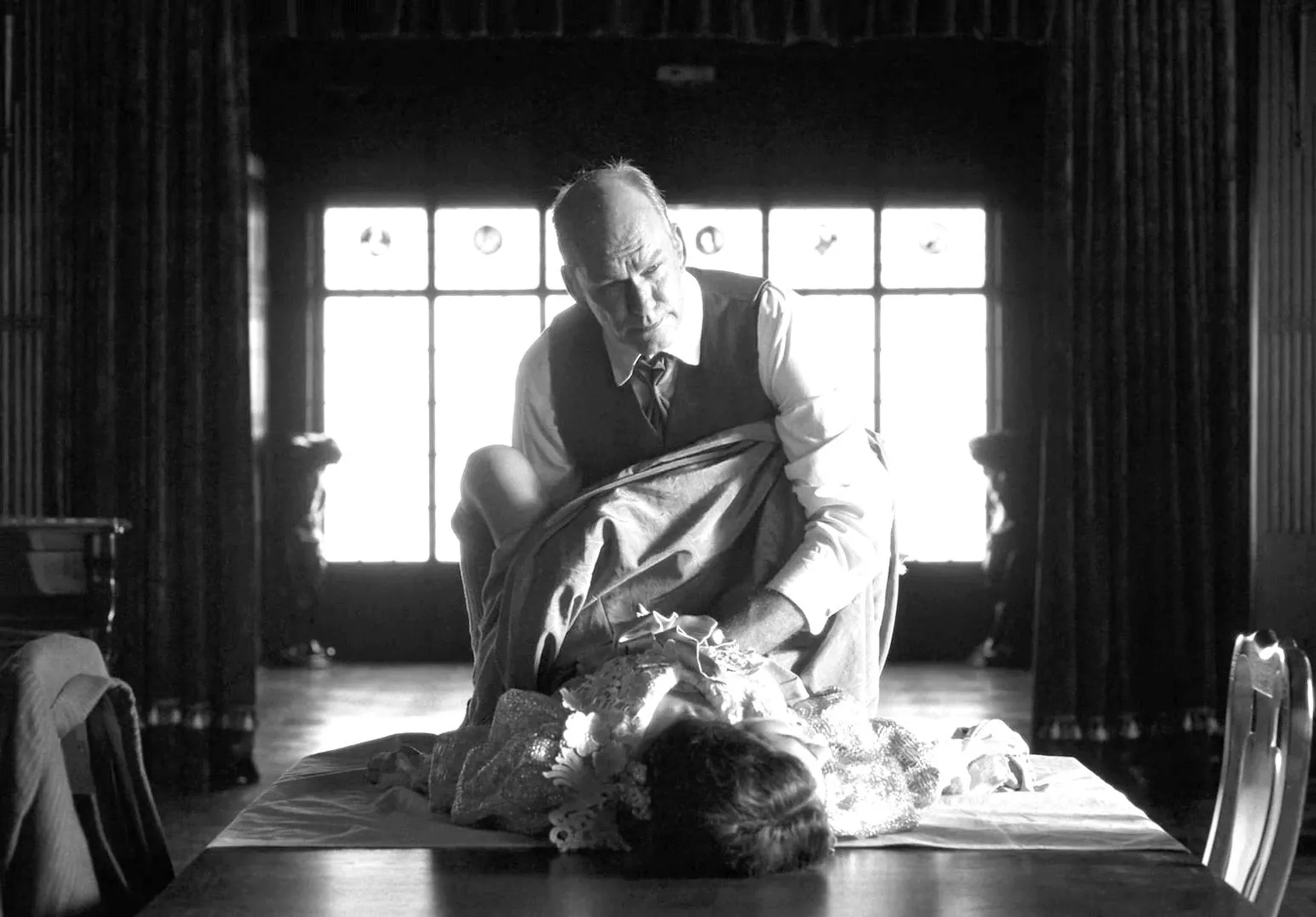 Jakob Højlev Jørgensen and Vic Carmen Sonne in The Girl with the Needle (2024)