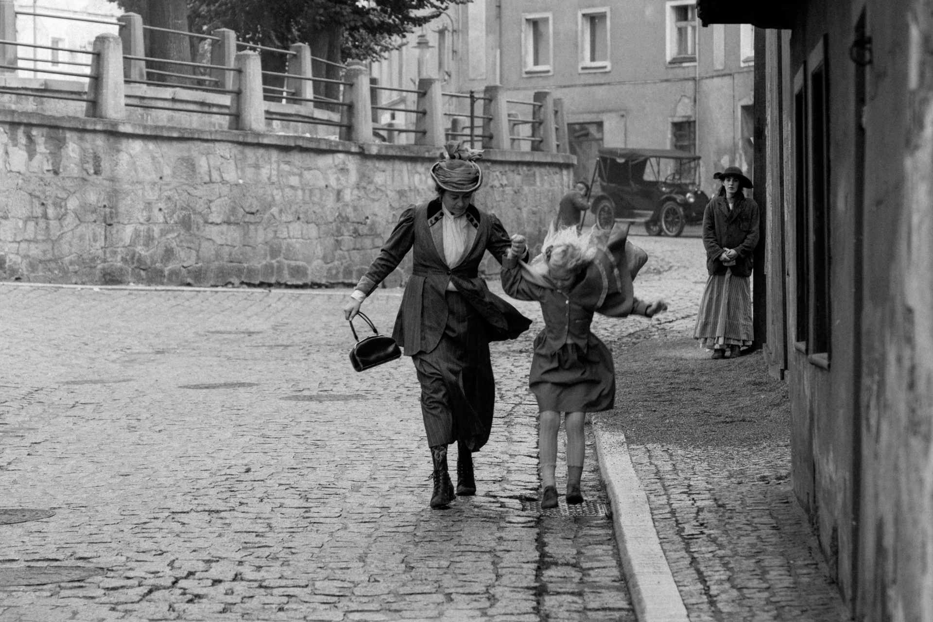 Ava Knox Martin and Vic Carmen Sonne in The Girl with the Needle (2024)