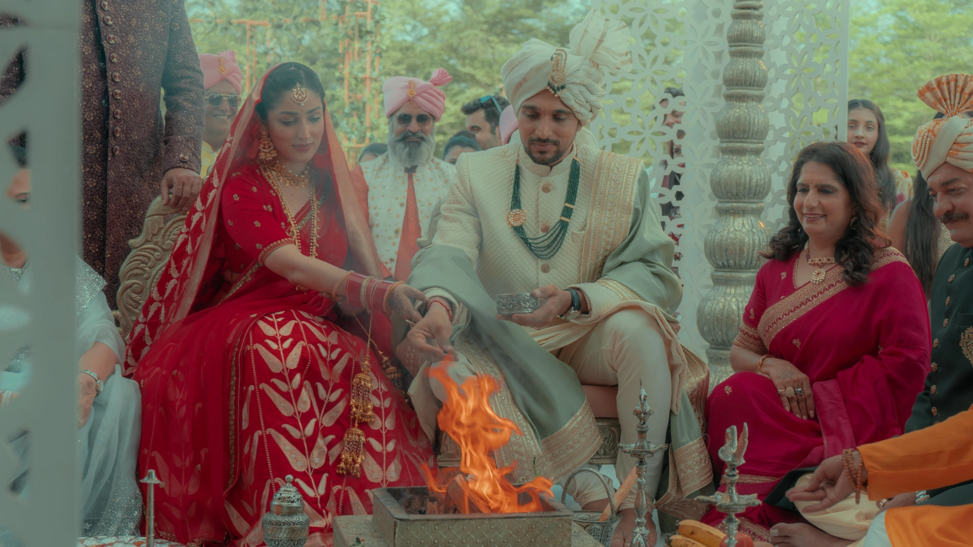 Pratik Gandhi and Yami Gautam in Dhoom Dhaam (2025)