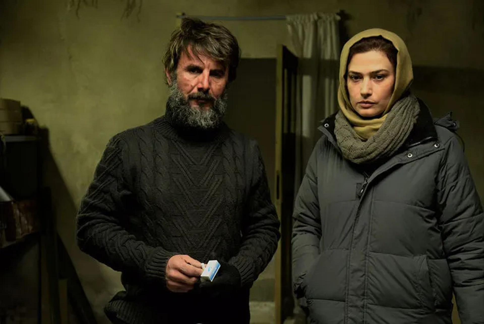Amin Hayayee and Ladan Mostofi in The Last Snow (2023)