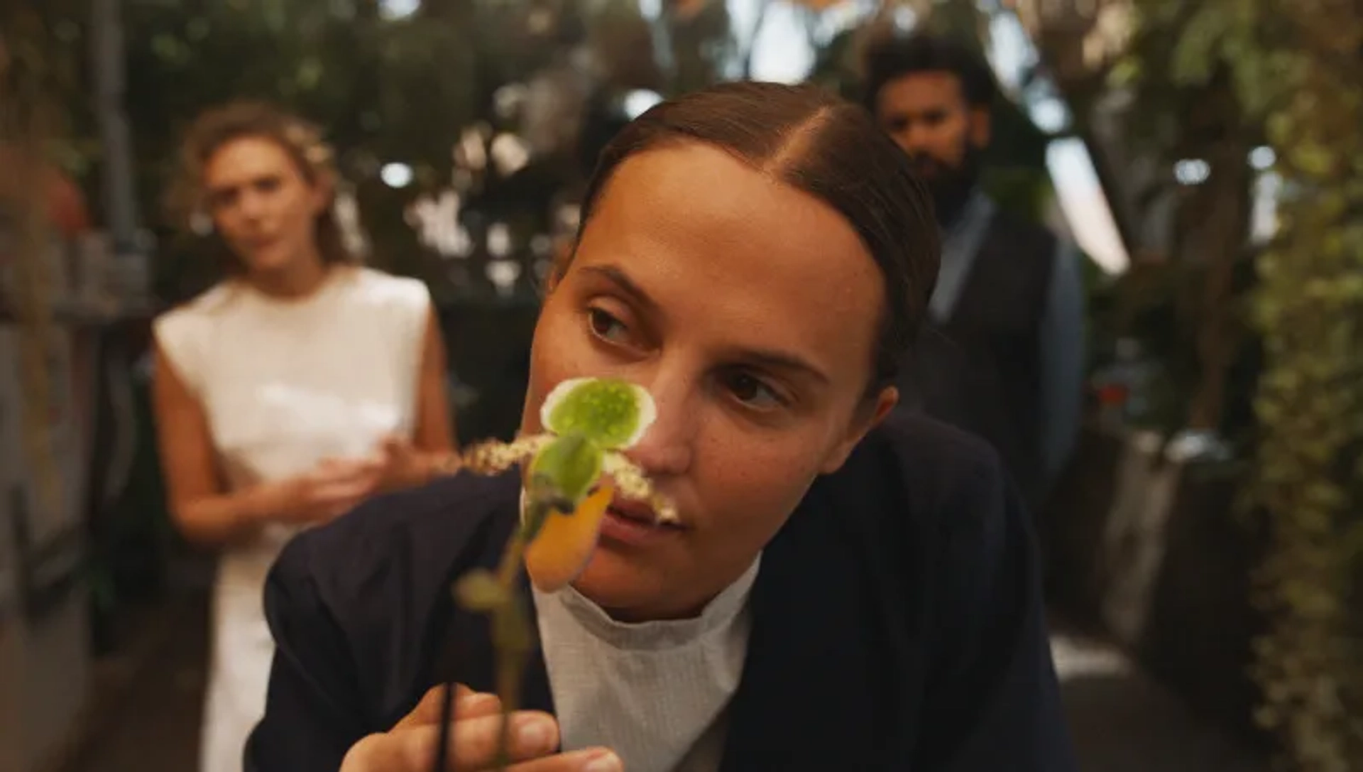 Elizabeth Olsen, Alicia Vikander, and Himesh Patel in The Assessment (2024)