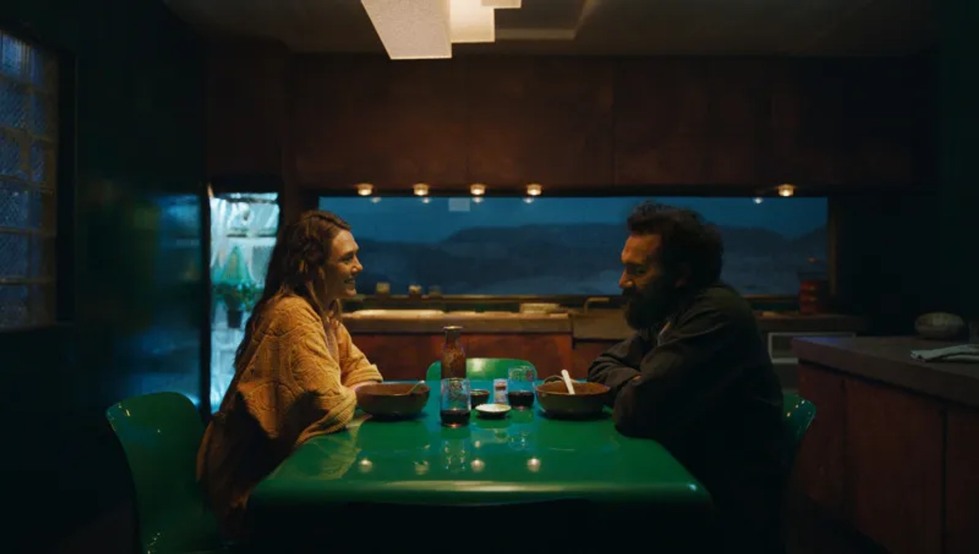Elizabeth Olsen and Himesh Patel in The Assessment (2024)