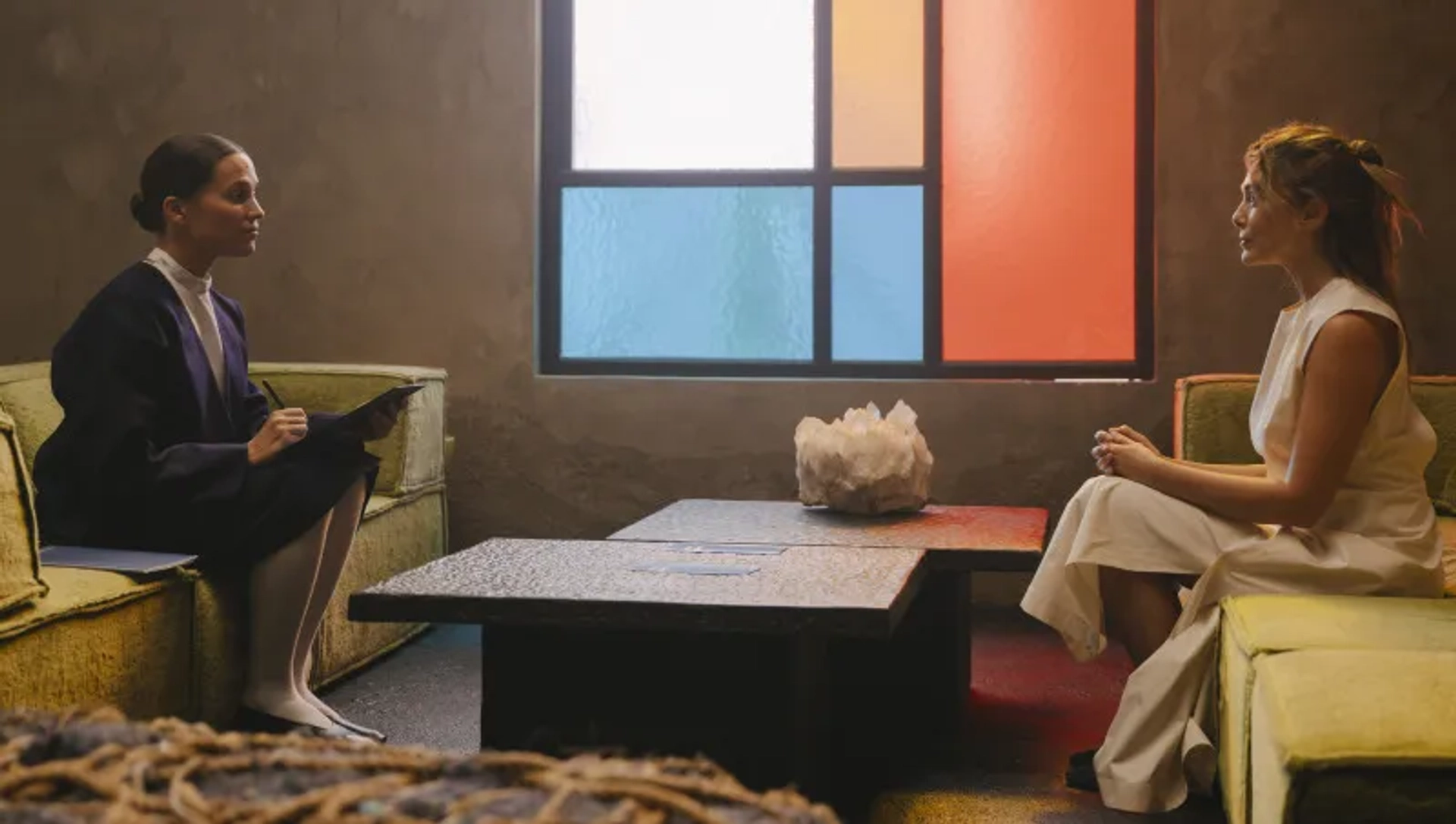 Elizabeth Olsen and Alicia Vikander in The Assessment (2024)