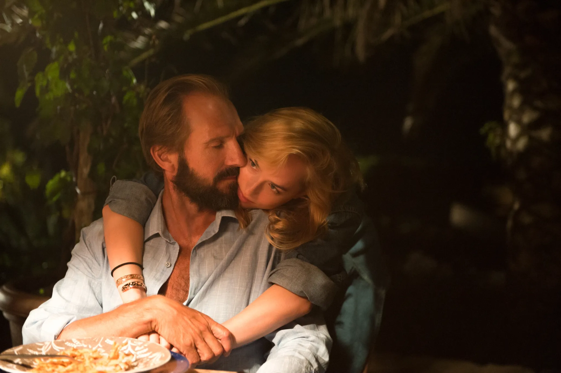 Ralph Fiennes and Dakota Johnson in A Bigger Splash (2015)