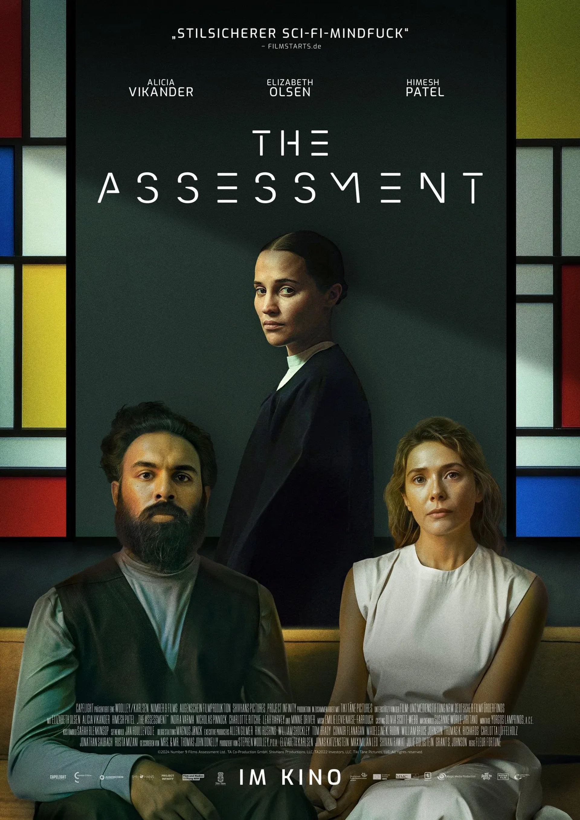 Elizabeth Olsen, Alicia Vikander, and Himesh Patel in The Assessment (2024)