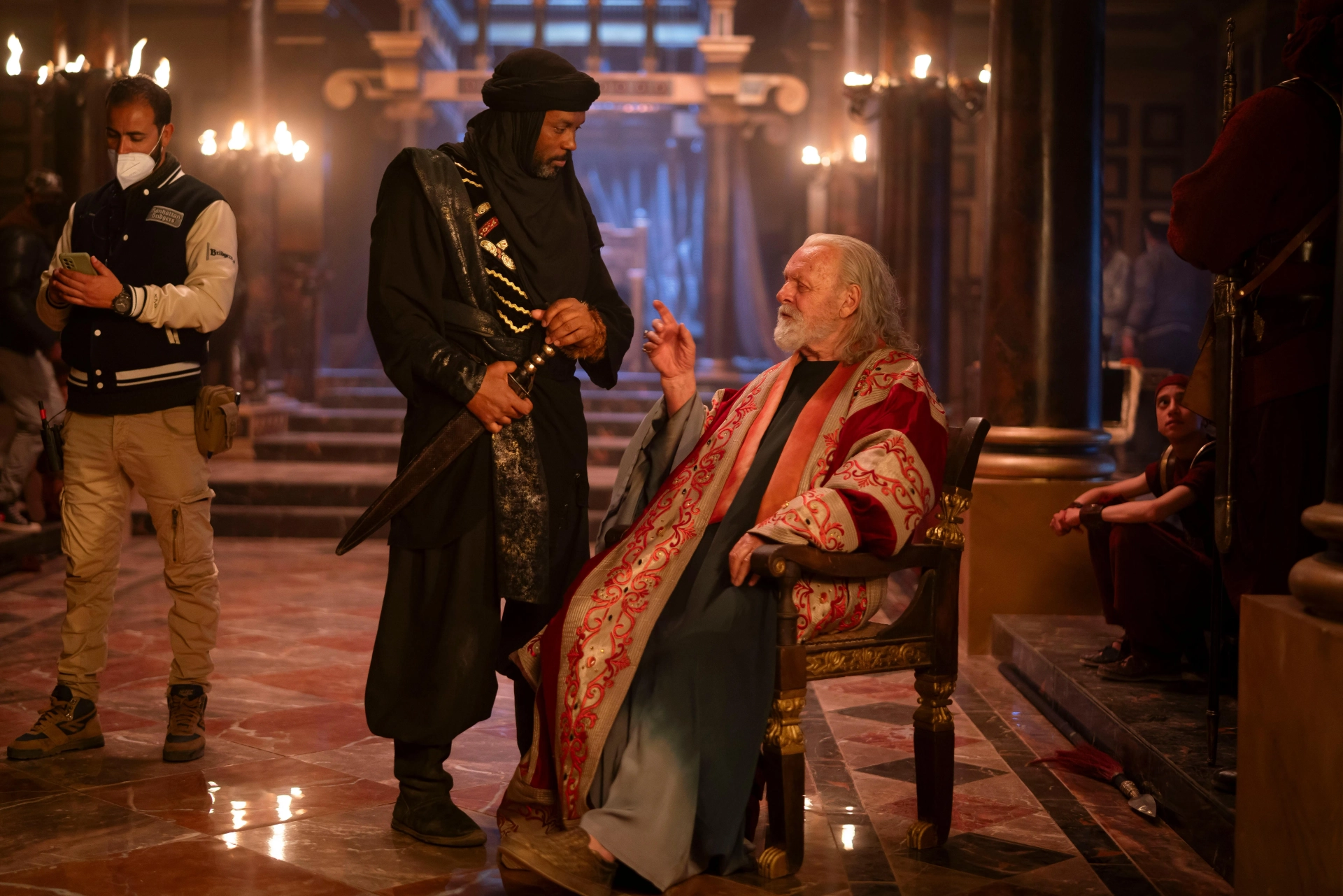 Kamal Moummad (VIHAAN) on set with Sir. Anthony Hopkins (KING HEROD) in MARY; directed by D.J. Caruso. Written by Timothy Michael Hayes. Produced by Mary Aloe, Hannah Leader, and Amory Leader. MARY is now streaming on NETFLIX.