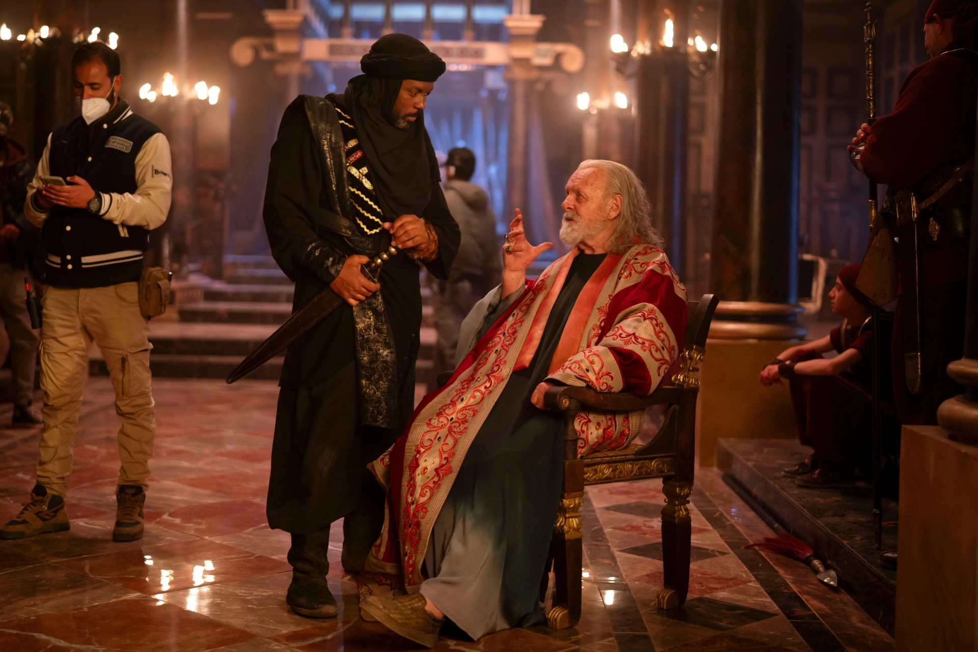 Kamal Moummad (VIHAAN) on set with Sir. Anthony Hopkins (KING HEROD) in MARY; directed by D.J. Caruso. Written by Timothy Michael Hayes. Produced by Mary Aloe, Hannah Leader, and Amory Leader. MARY is now streaming on NETFLIX.