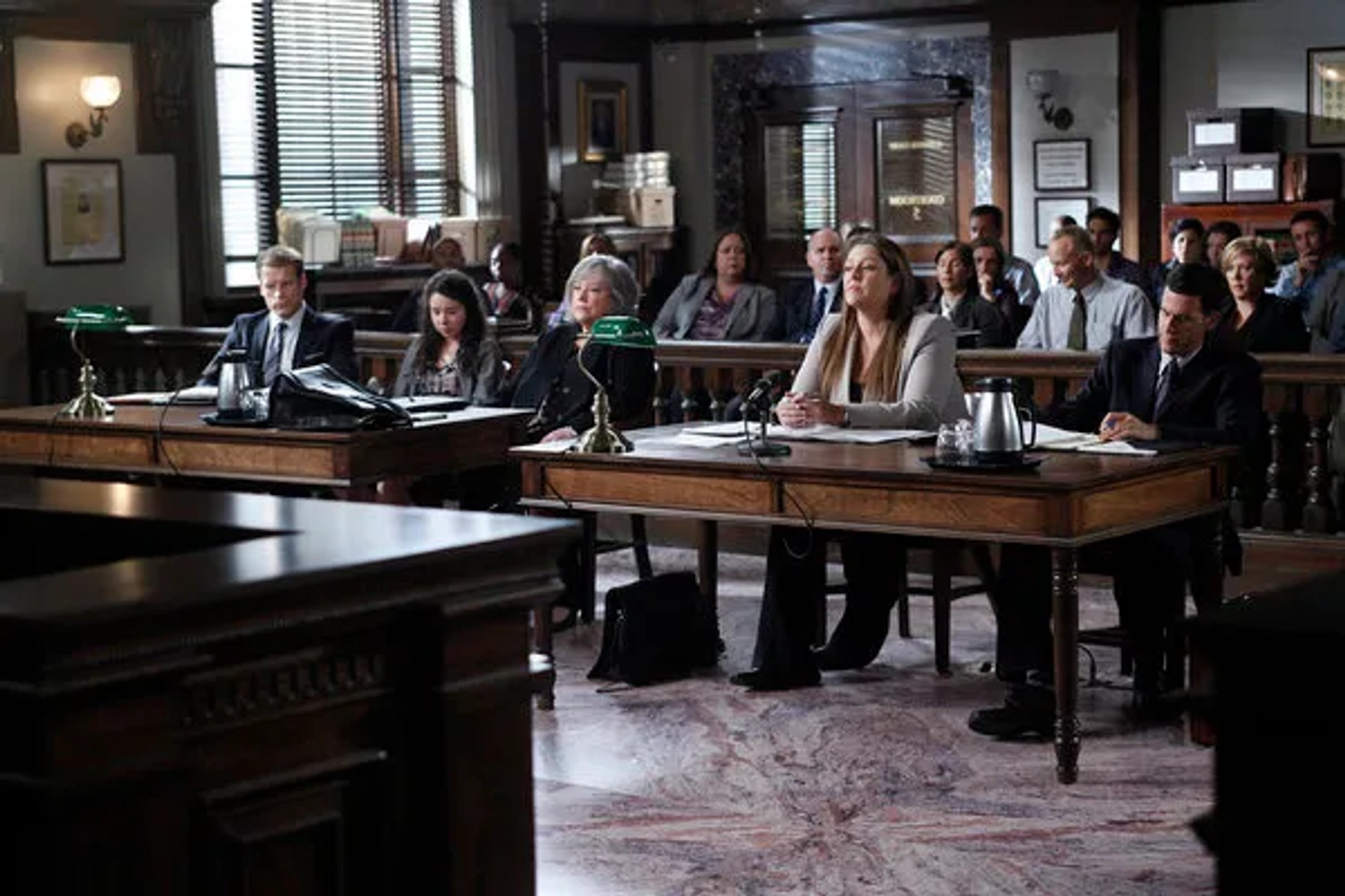 Kathy Bates, Camryn Manheim, Tim Scanlon, and Mark Valley in Harry's Law (2011)