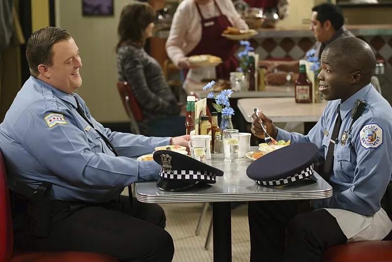 Reno Wilson and Billy Gardell in Mike & Molly (2010)