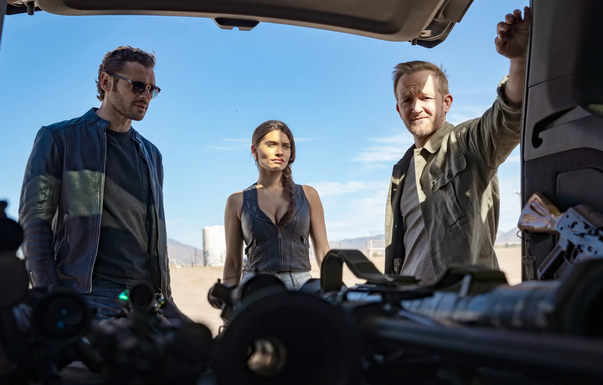Eric Ladin, Eva De Dominici, and Adan Canto in The Cleaning Lady (2022)