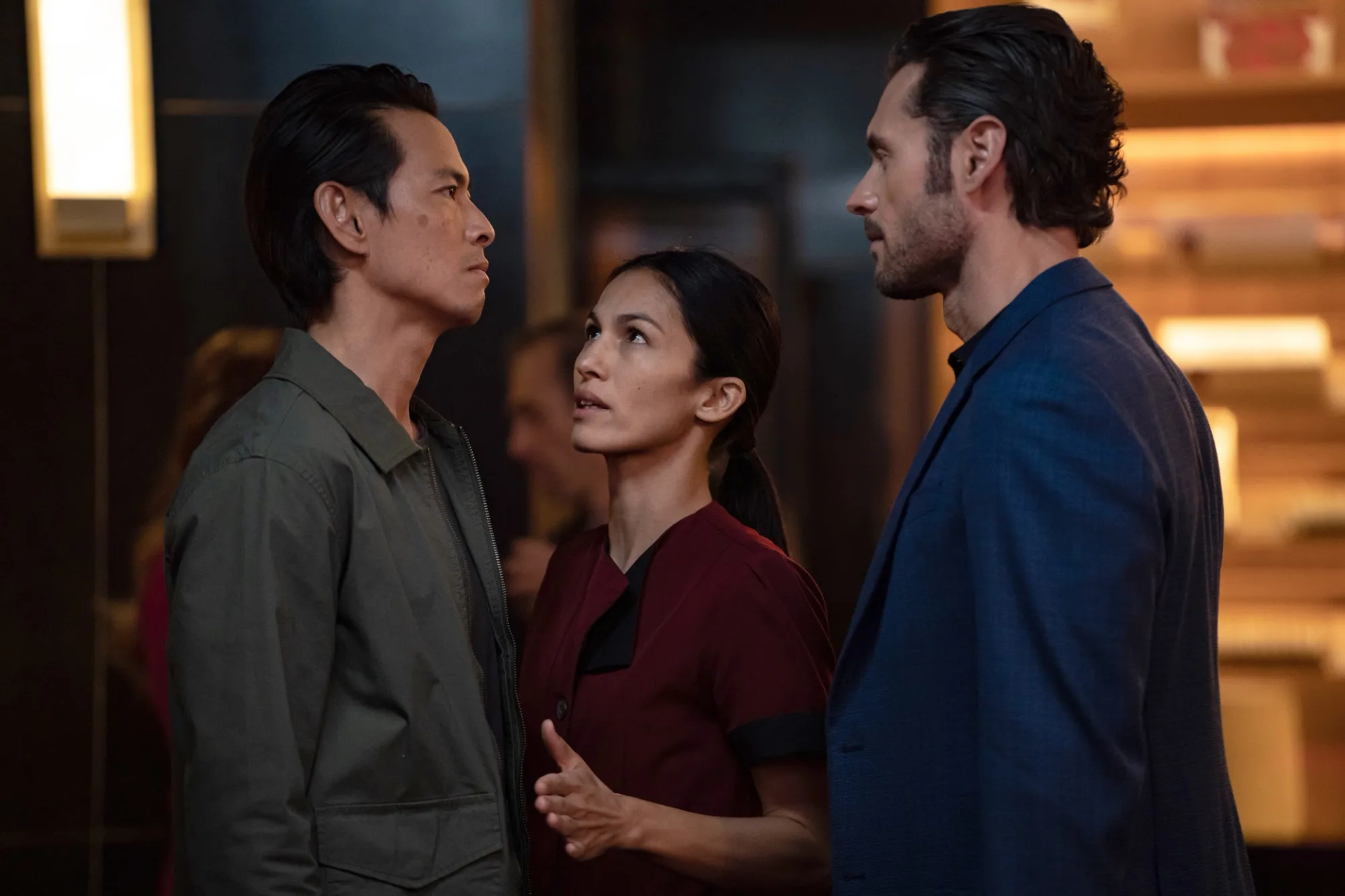 Ivan Shaw, Elodie Yung, and Adan Canto in The Cleaning Lady (2022)