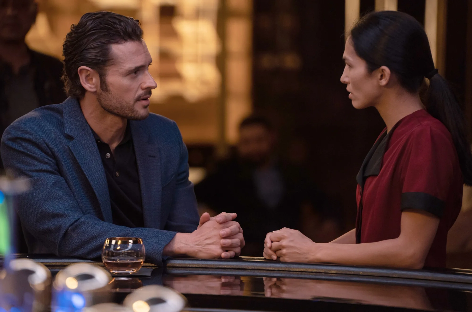 Elodie Yung and Adan Canto in The Cleaning Lady (2022)