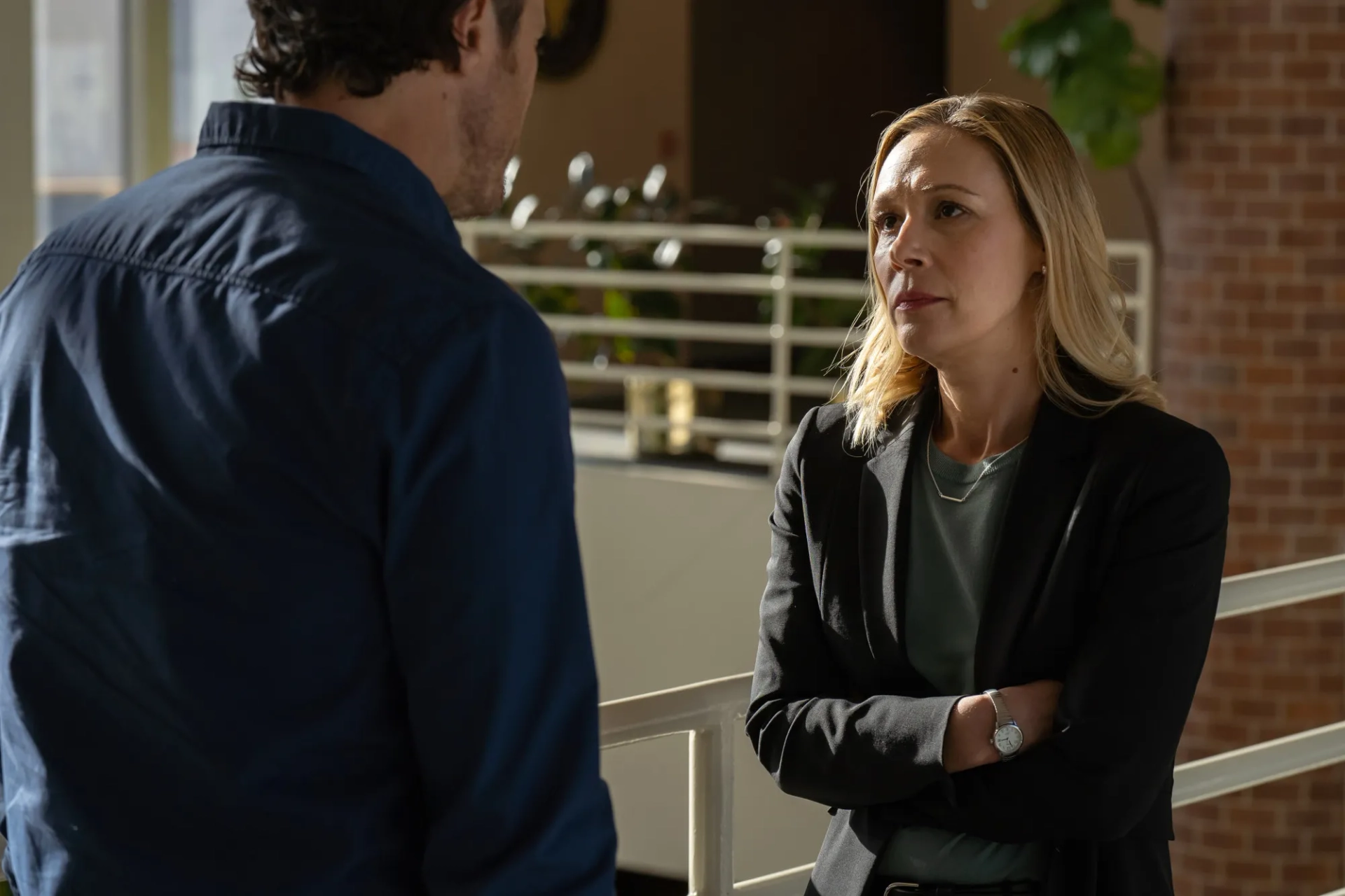 Oliver Hudson and Liza Weil in The Cleaning Lady (2022)