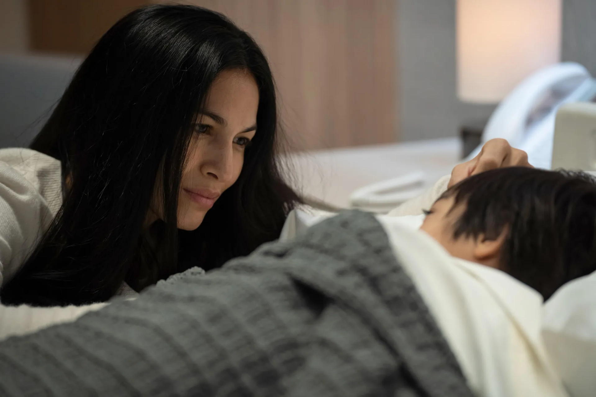 Valentino LaSalle and Elodie Yung in The Cleaning Lady (2022)