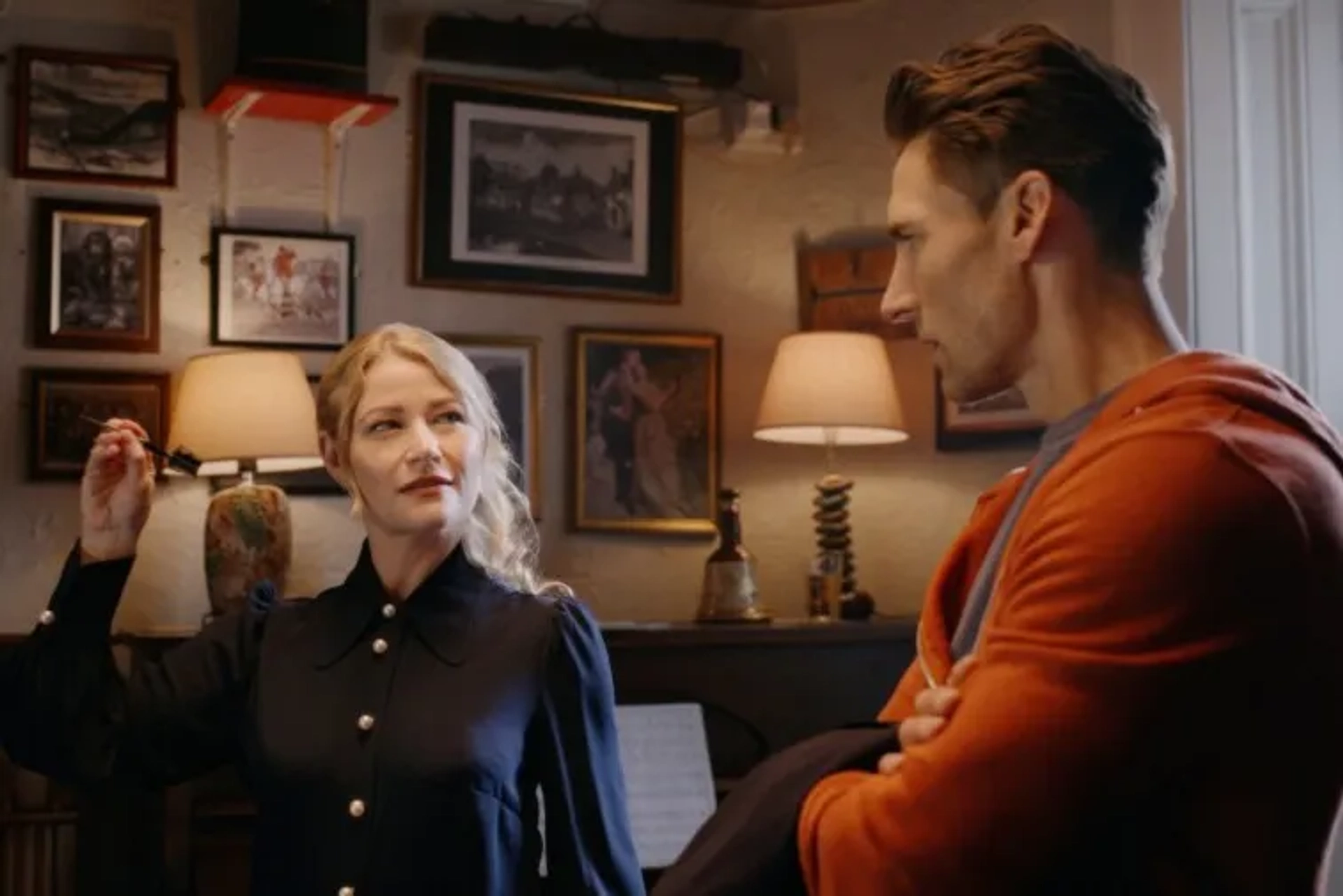 Emilie de Ravin and Andrew W. Walker in The Reluctant Royal (2025)