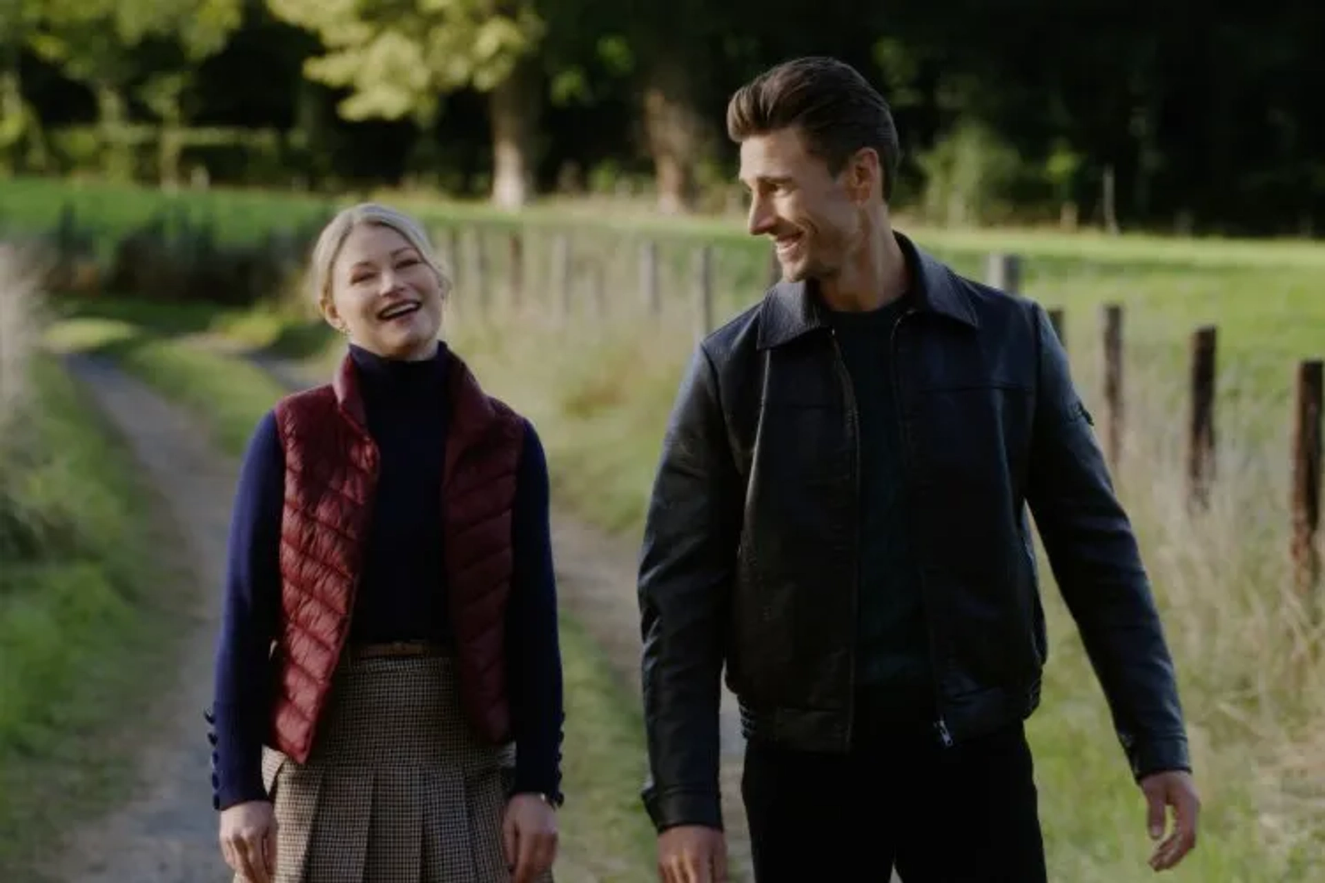 Emilie de Ravin and Andrew W. Walker in The Reluctant Royal (2025)