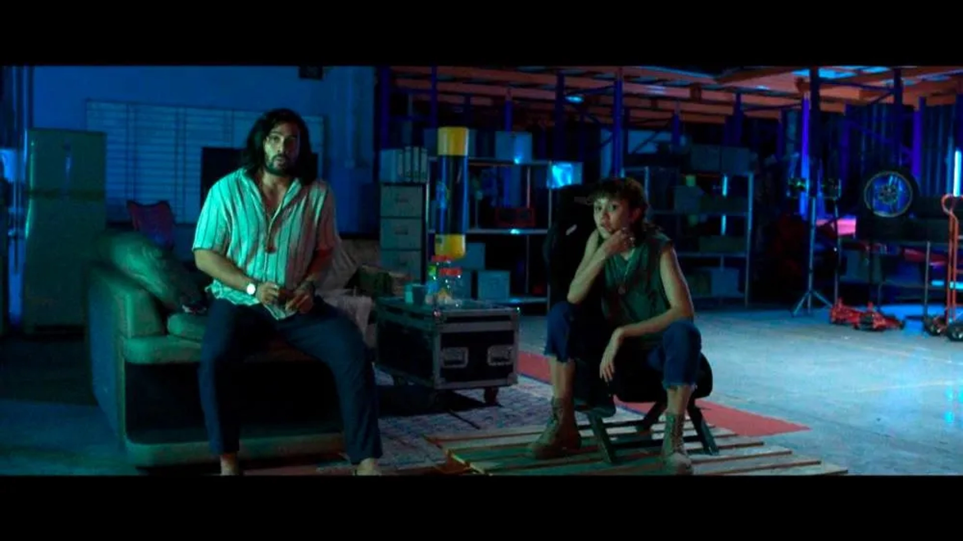 Mimi Lana and Remy Ishak in The Experts (2024)