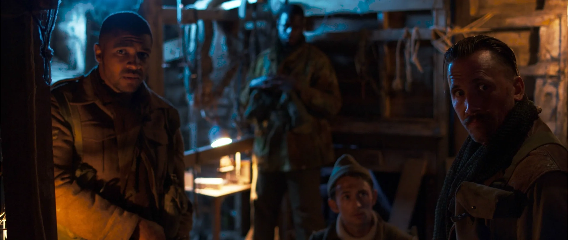 Max Gates, James Oliver Wheatley, Asan N'Jie, and Daniel Thrace in Fortunes of War (2024)
