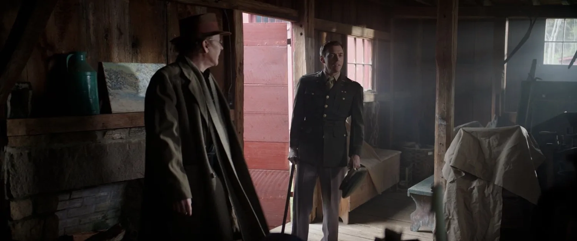 John Cusack and Jake Abel in Fog of War (2025)