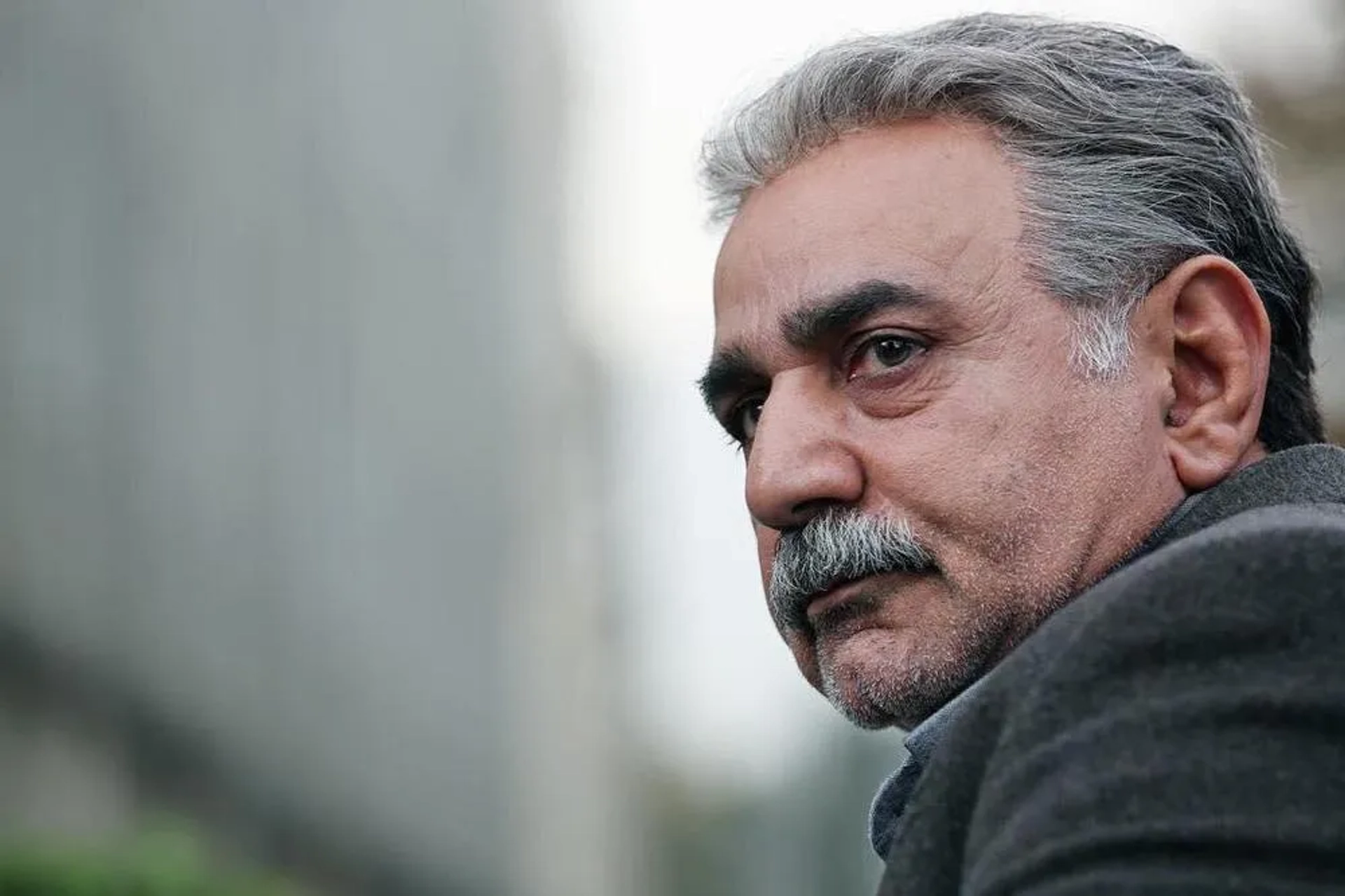 Parviz Parastui in House of Paper (2017)