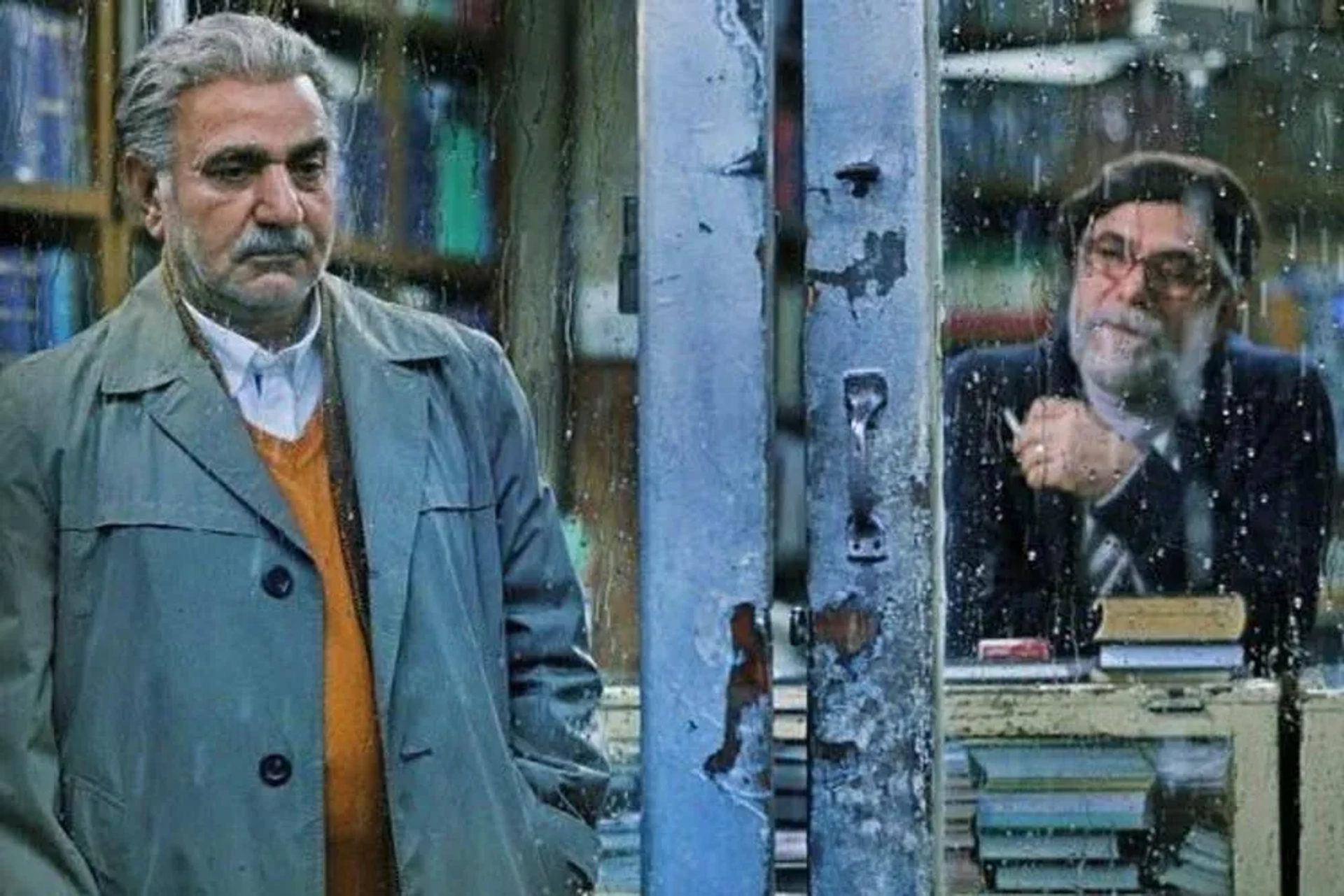 Parviz Parastui and Hossein Pakdel in House of Paper (2017)