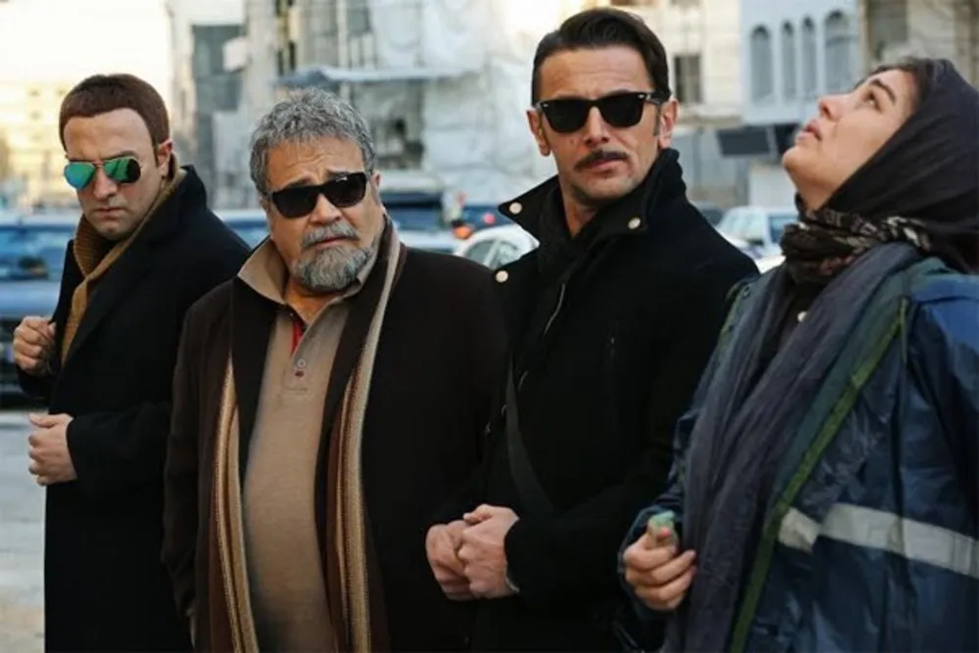 Mohammad Reza Sharifinia, Amin Hayayee, Majid Salehi, and Sahar Ghoreishi in Three Strangers (2017)