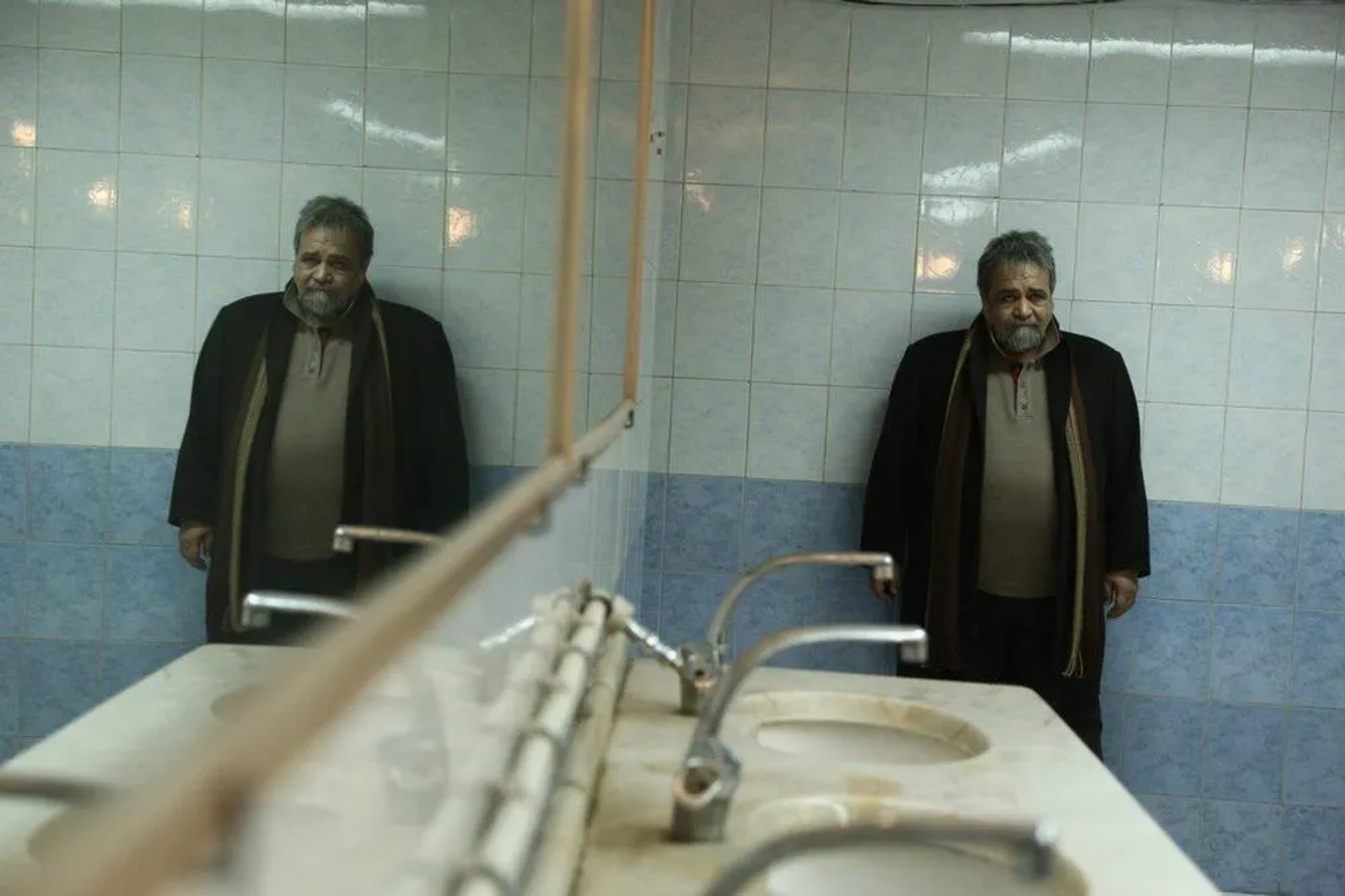 Mohammad Reza Sharifinia in Three Strangers (2017)