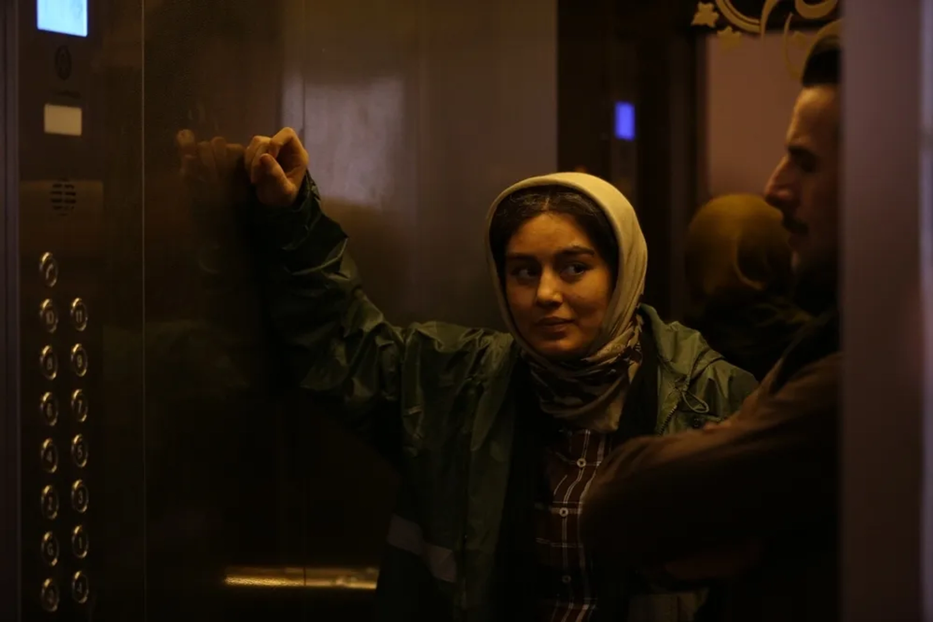 Amin Hayayee and Sahar Ghoreishi in Three Strangers (2017)